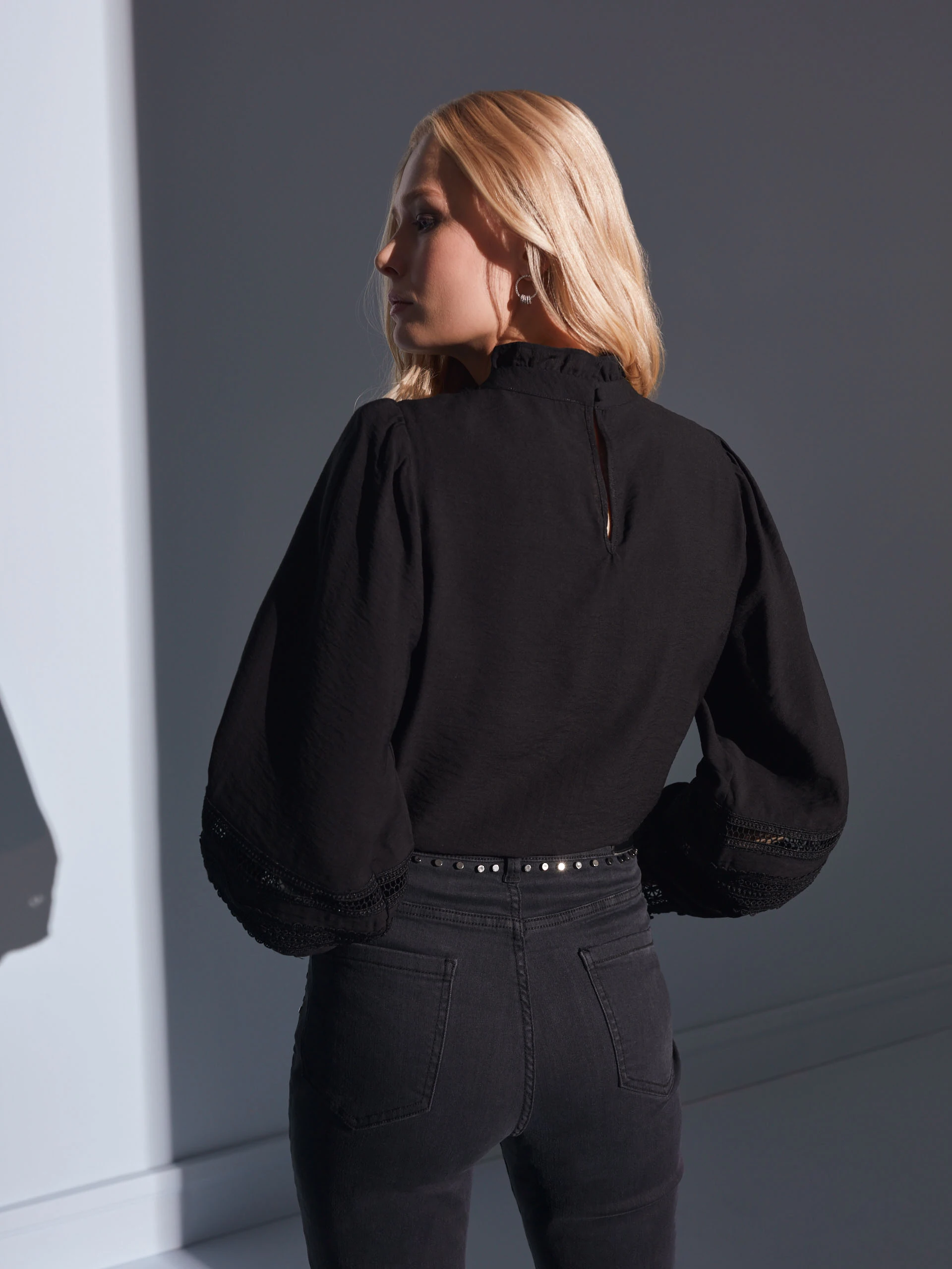 BLACK BLOUSE WITH LACE ELEMENTS