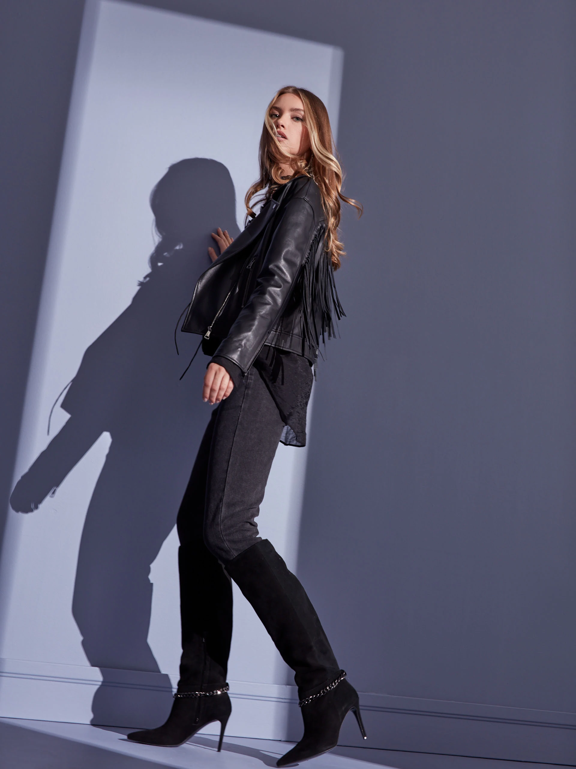 BLACK LEATHER RAMONESKI WITH TASSELS