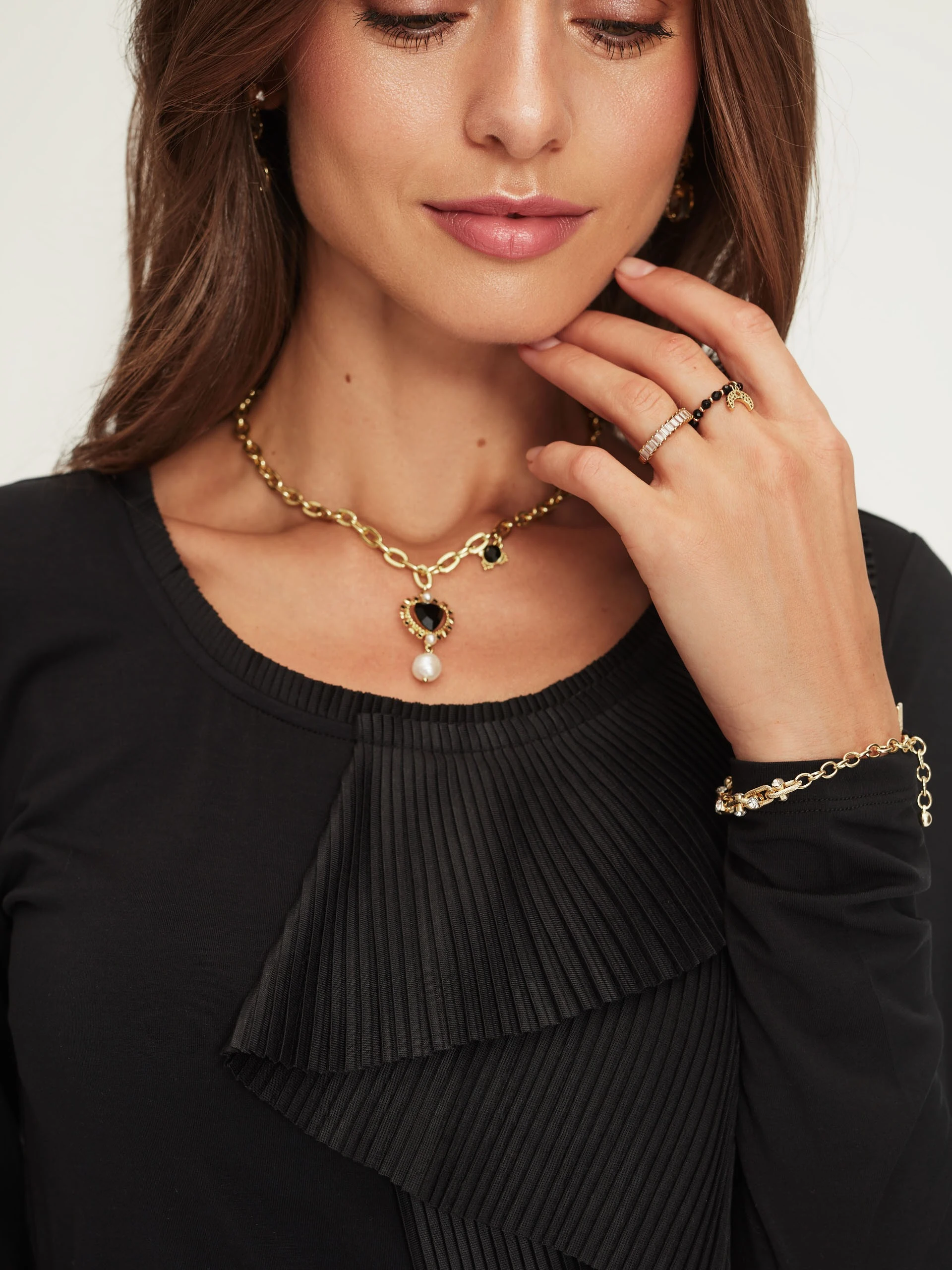 Black blouse with asymmetrical jabot