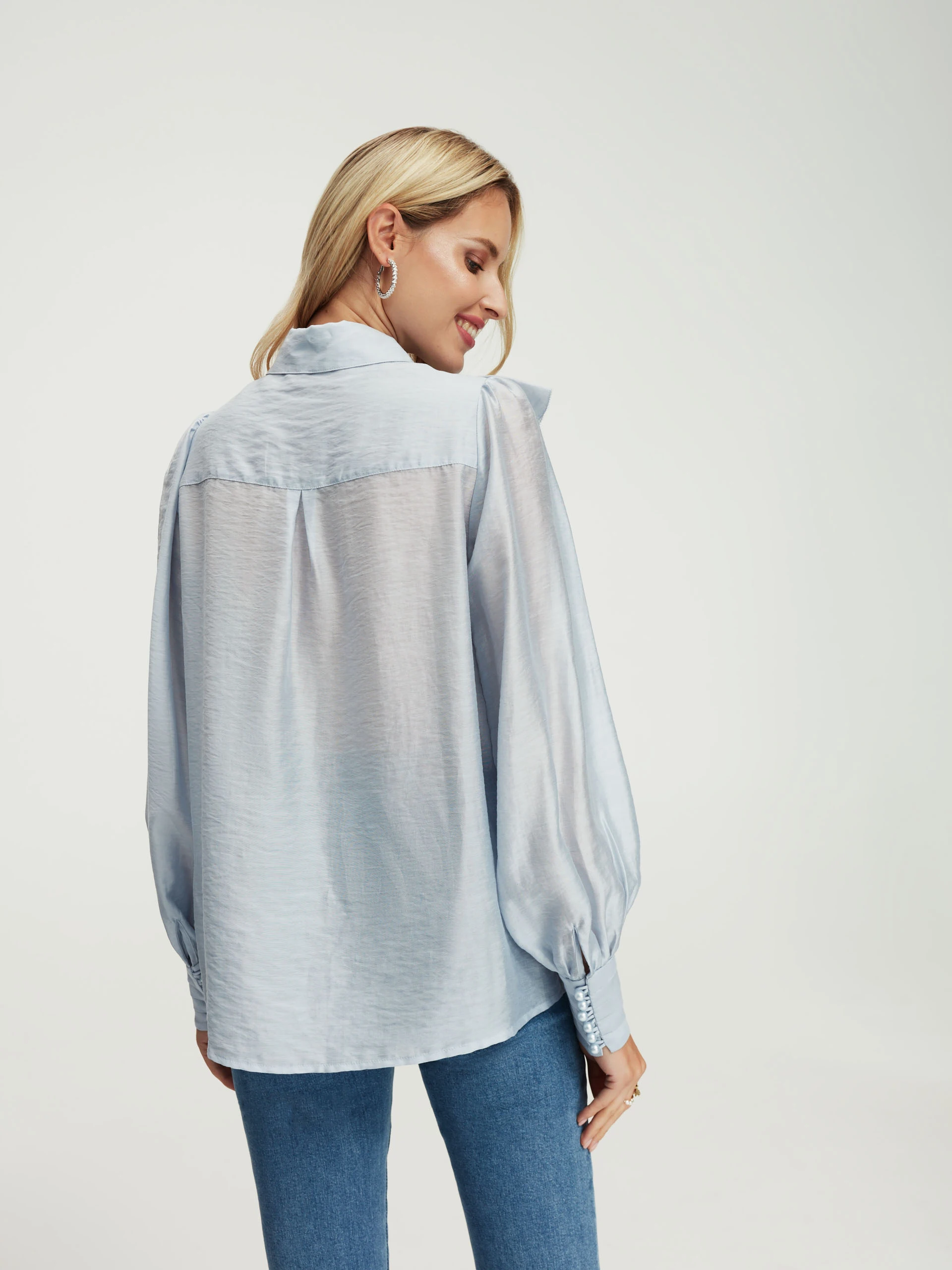 Blue blouse with ruffles