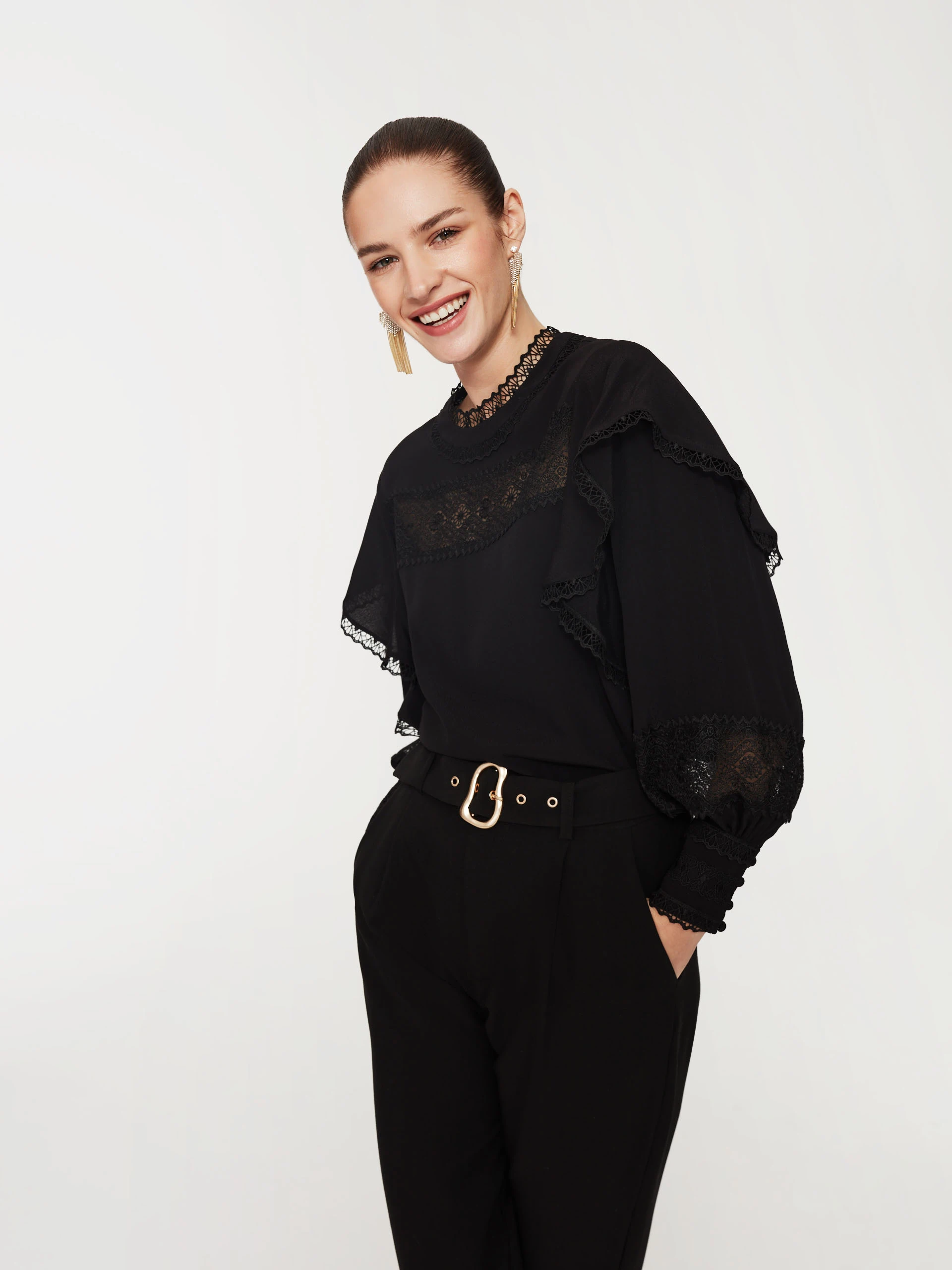 Black blouse with lace inserts