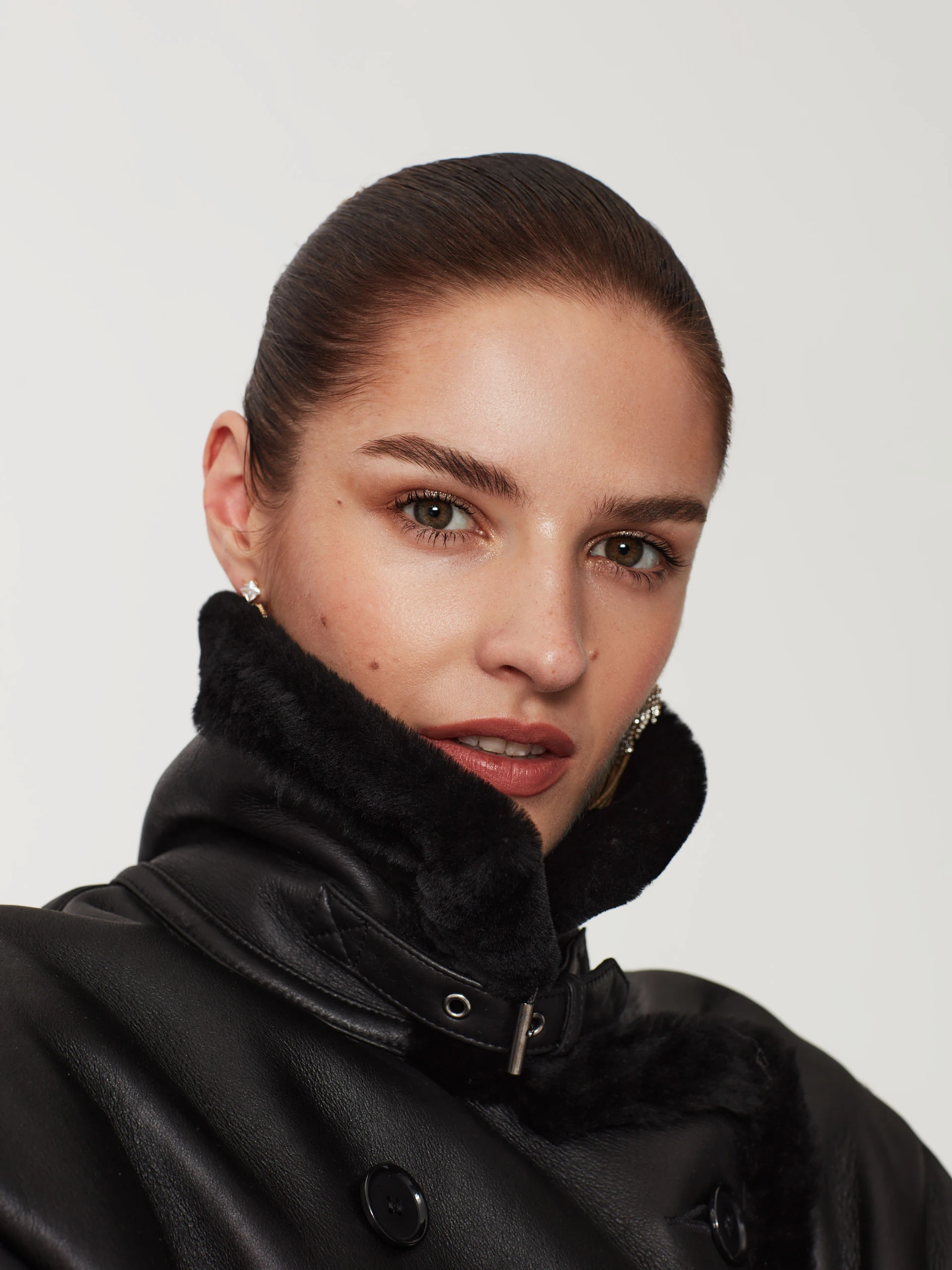 Black double-breasted sheepskin coat