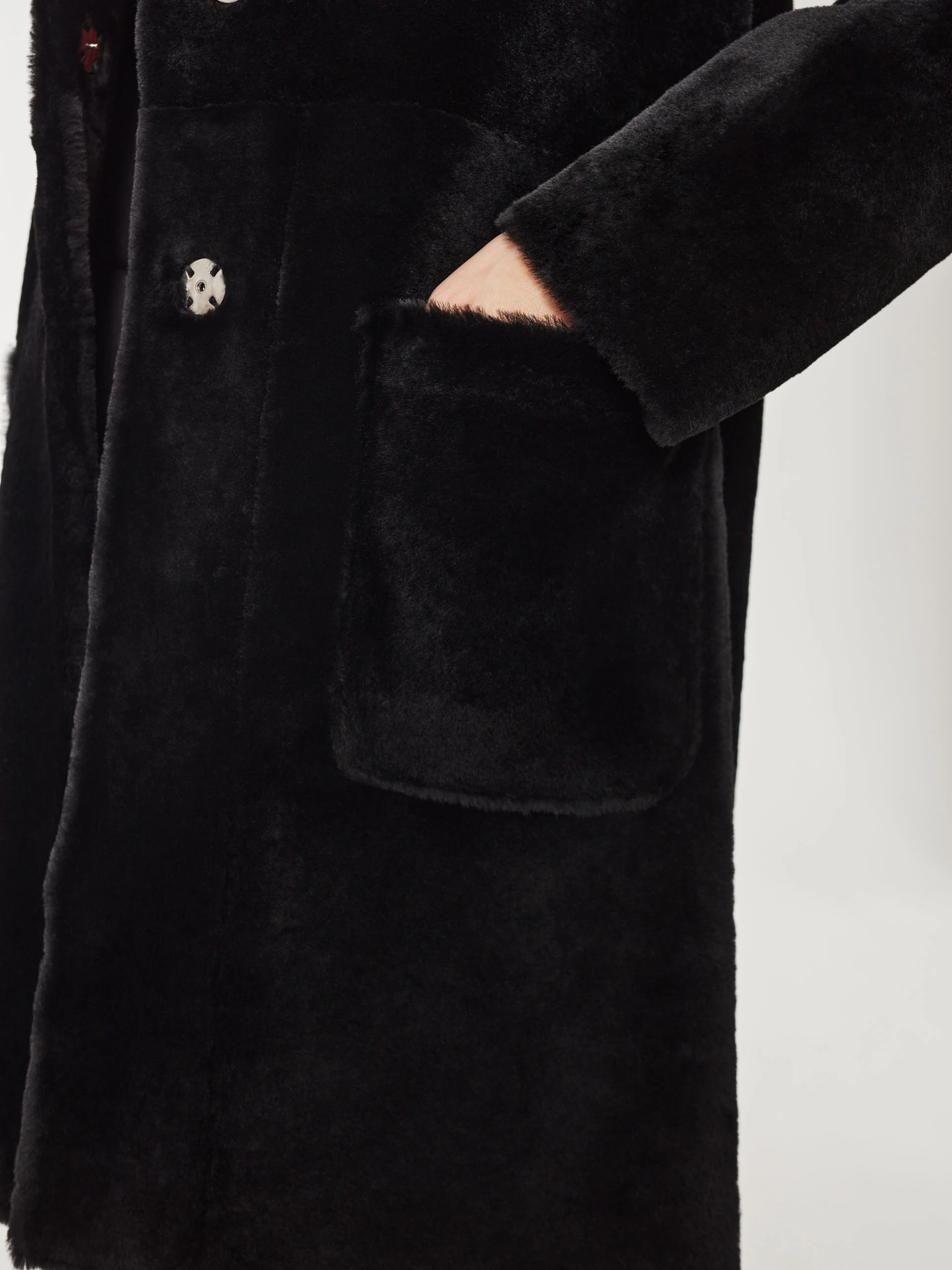 Black sheepskin coat with pockets