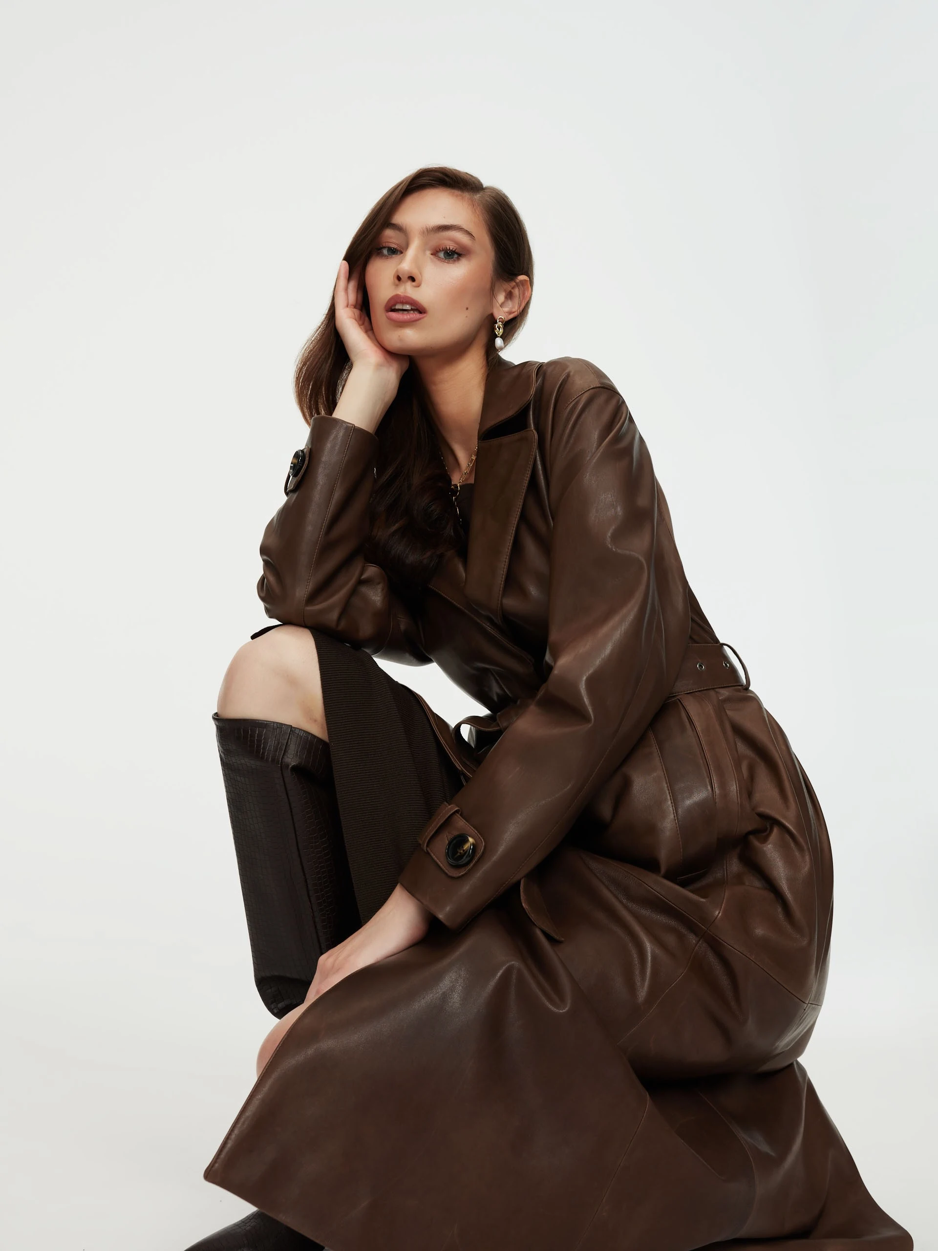 Leather coat in brown color