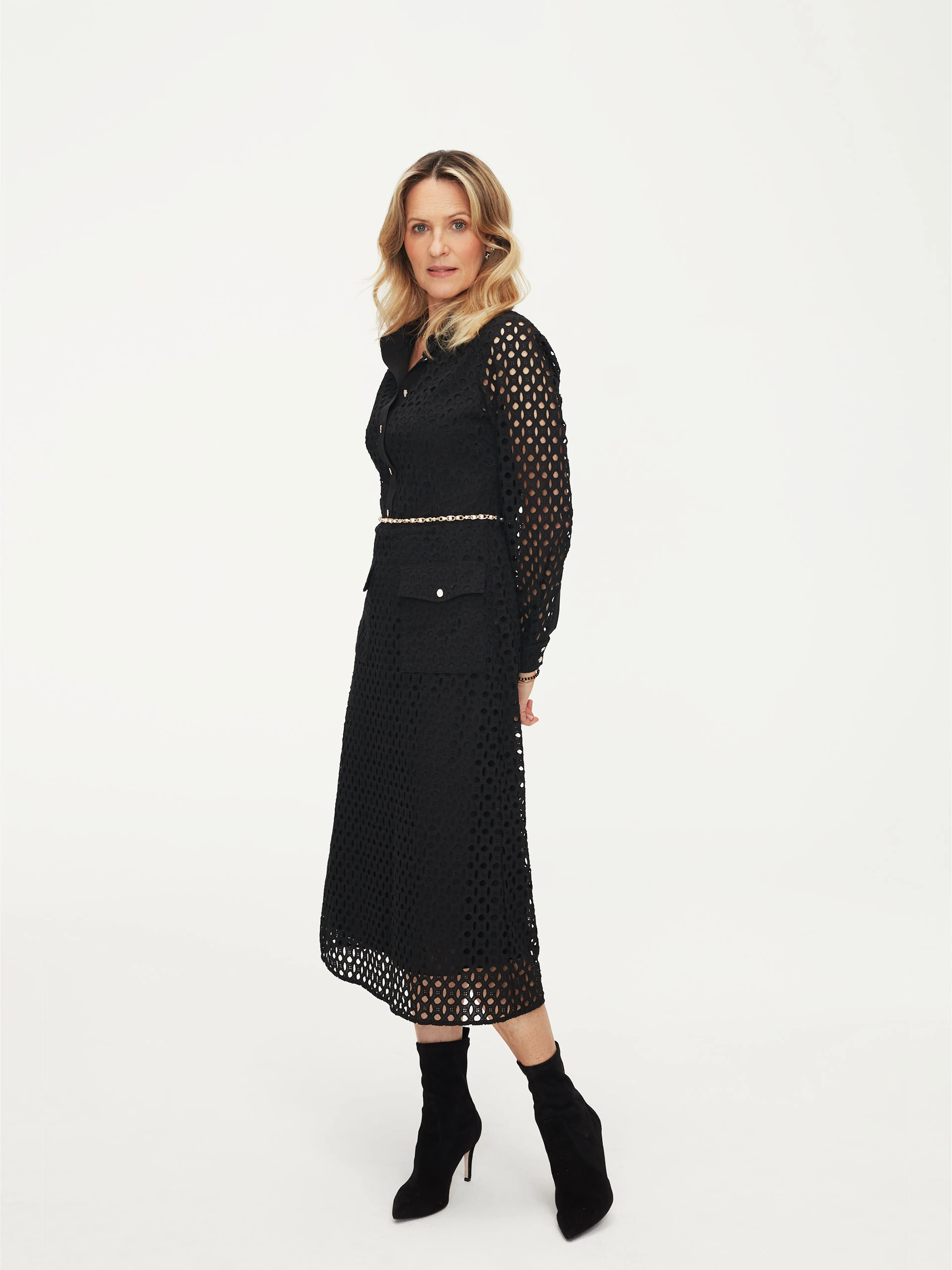 Black openwork dress with patch pockets