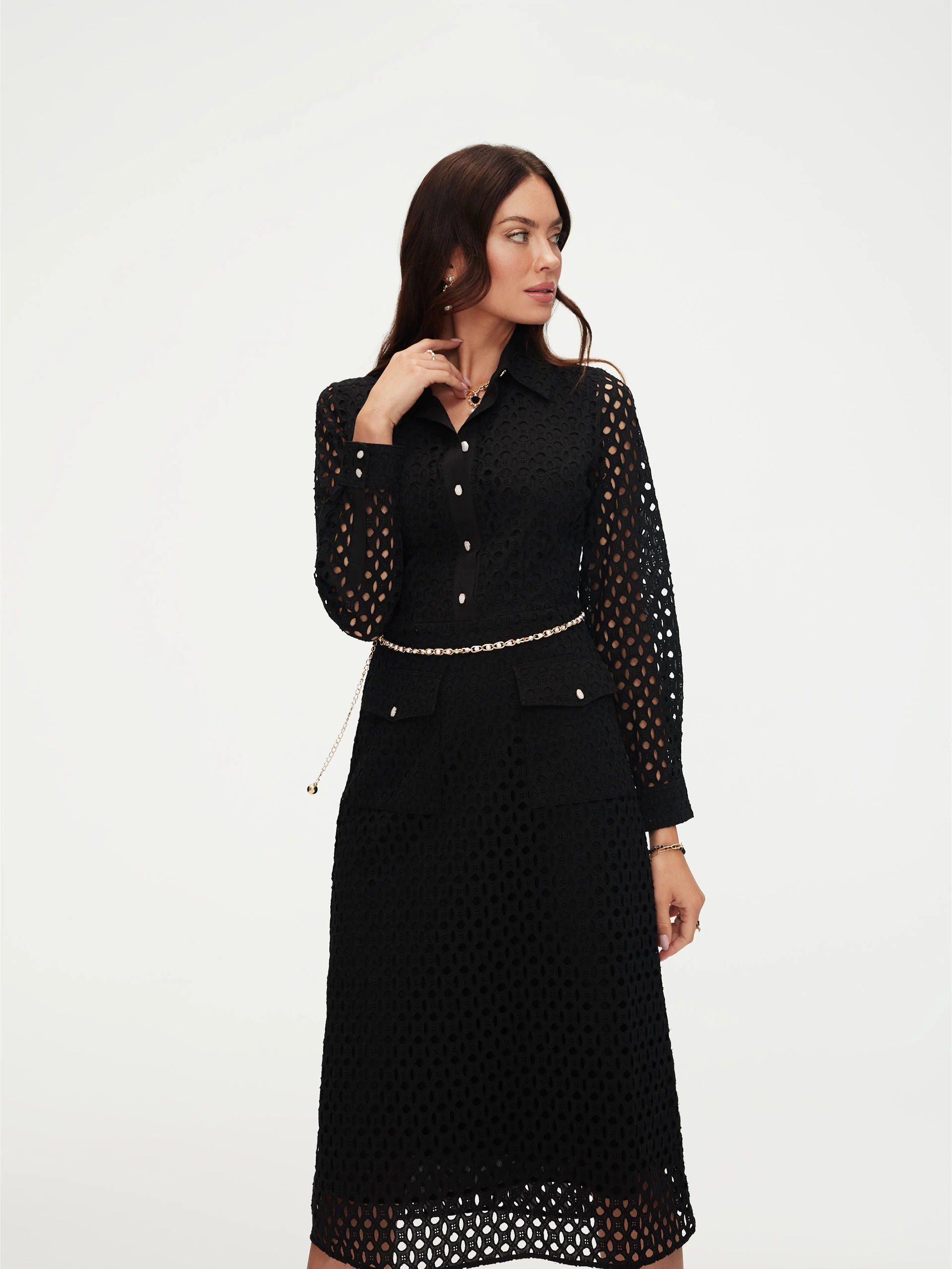 Black openwork dress with patch pockets