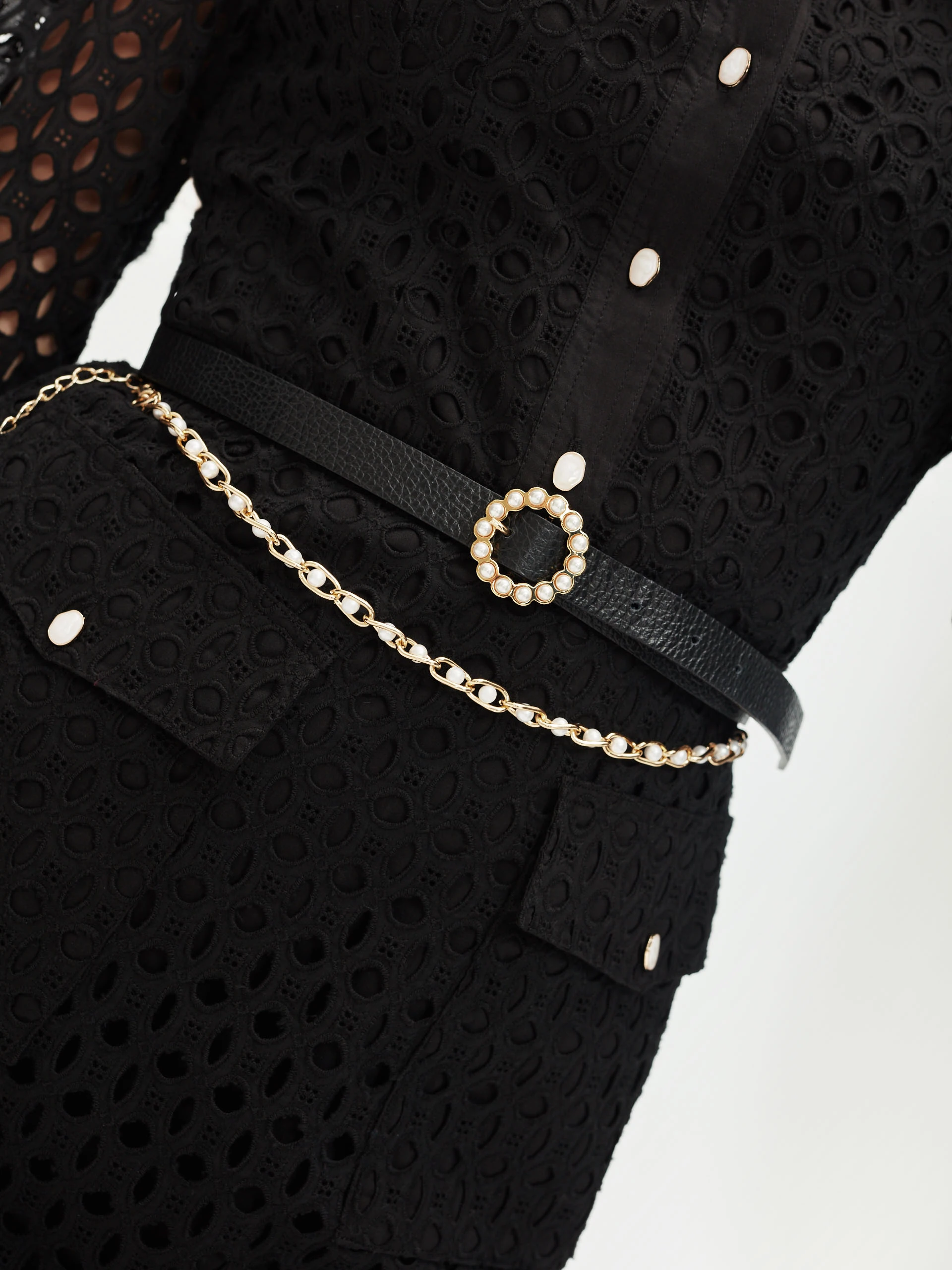 Black openwork dress with patch pockets