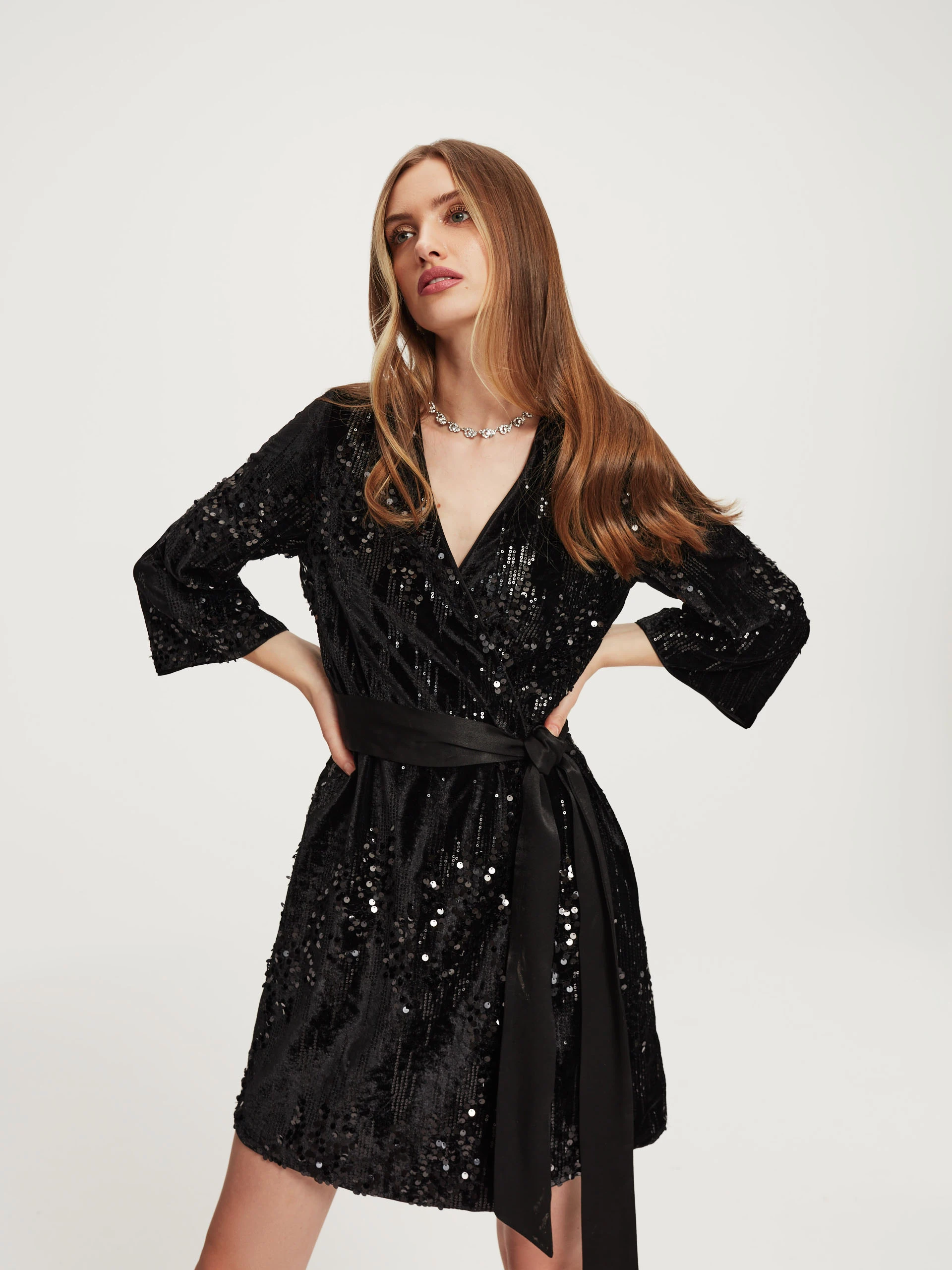 Sequin dress with binding