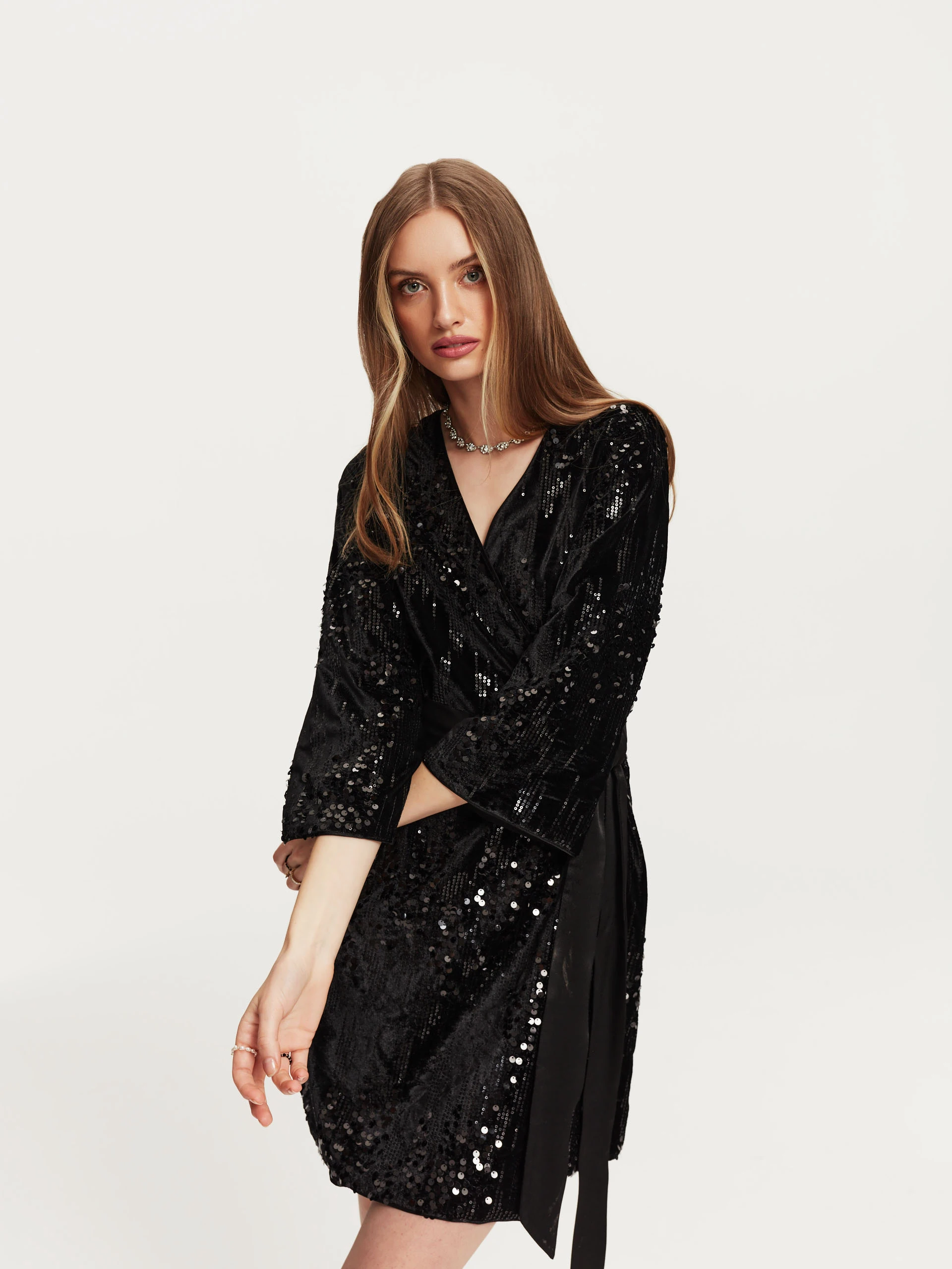 Sequin dress with binding