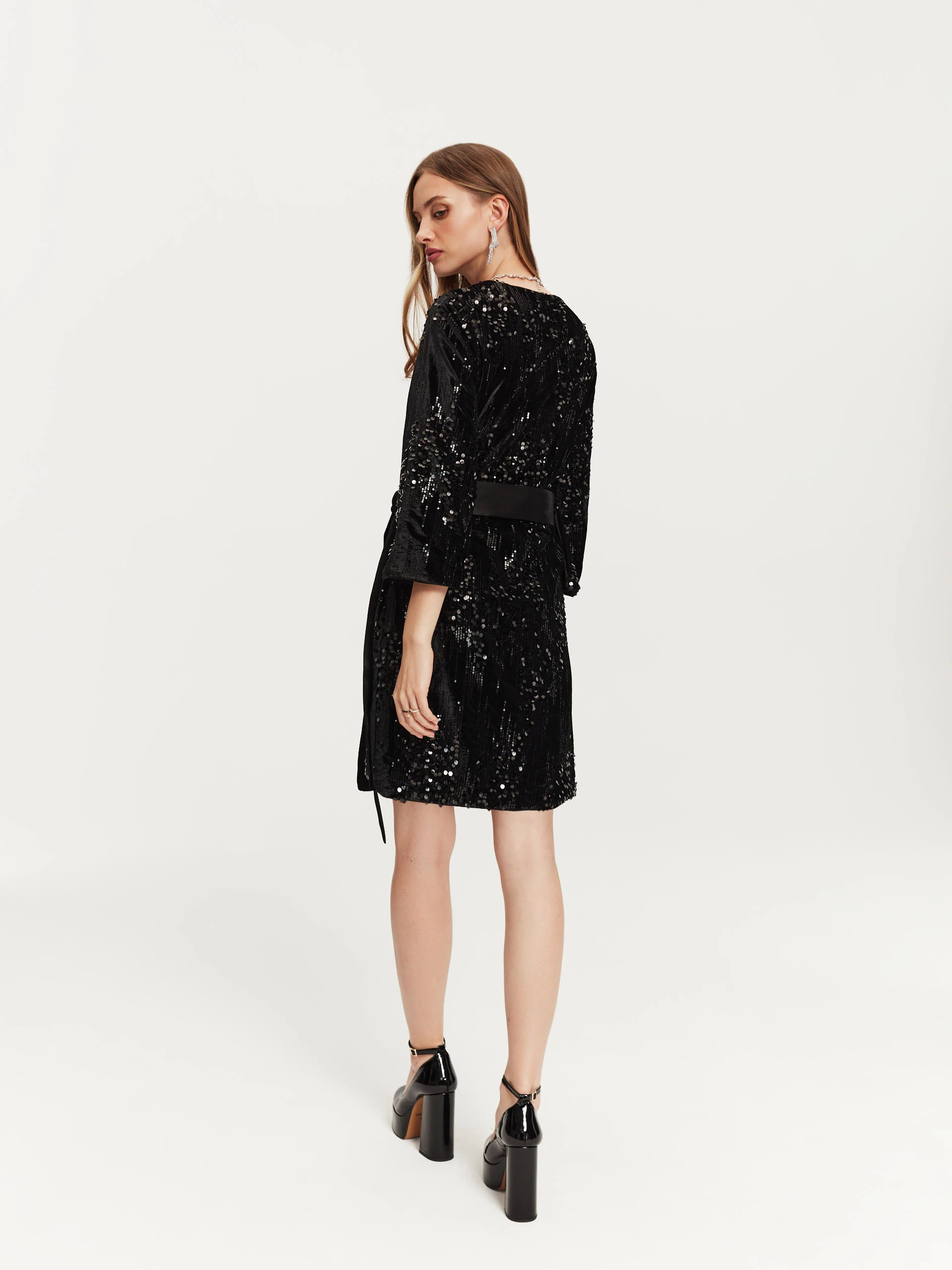 Sequin dress with binding