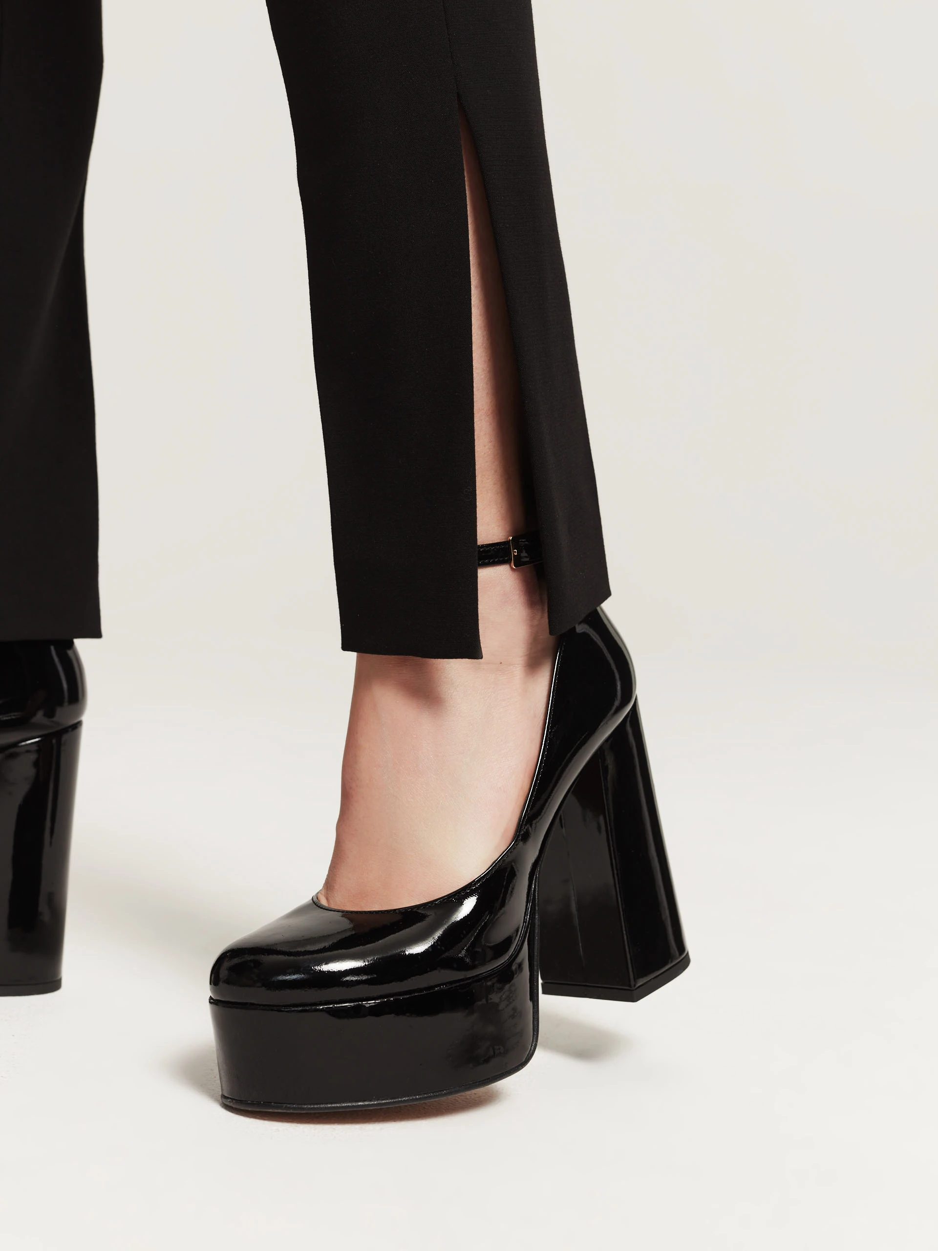 Black high-waisted cigarette pants