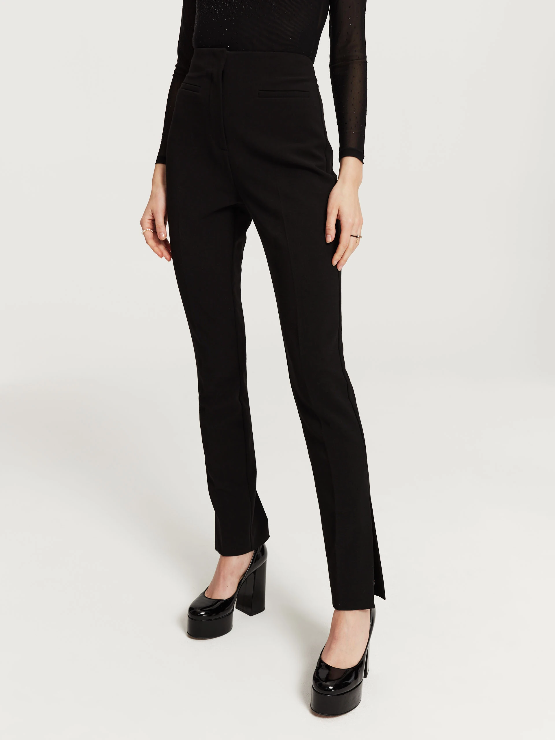 Black high-waisted cigarette pants