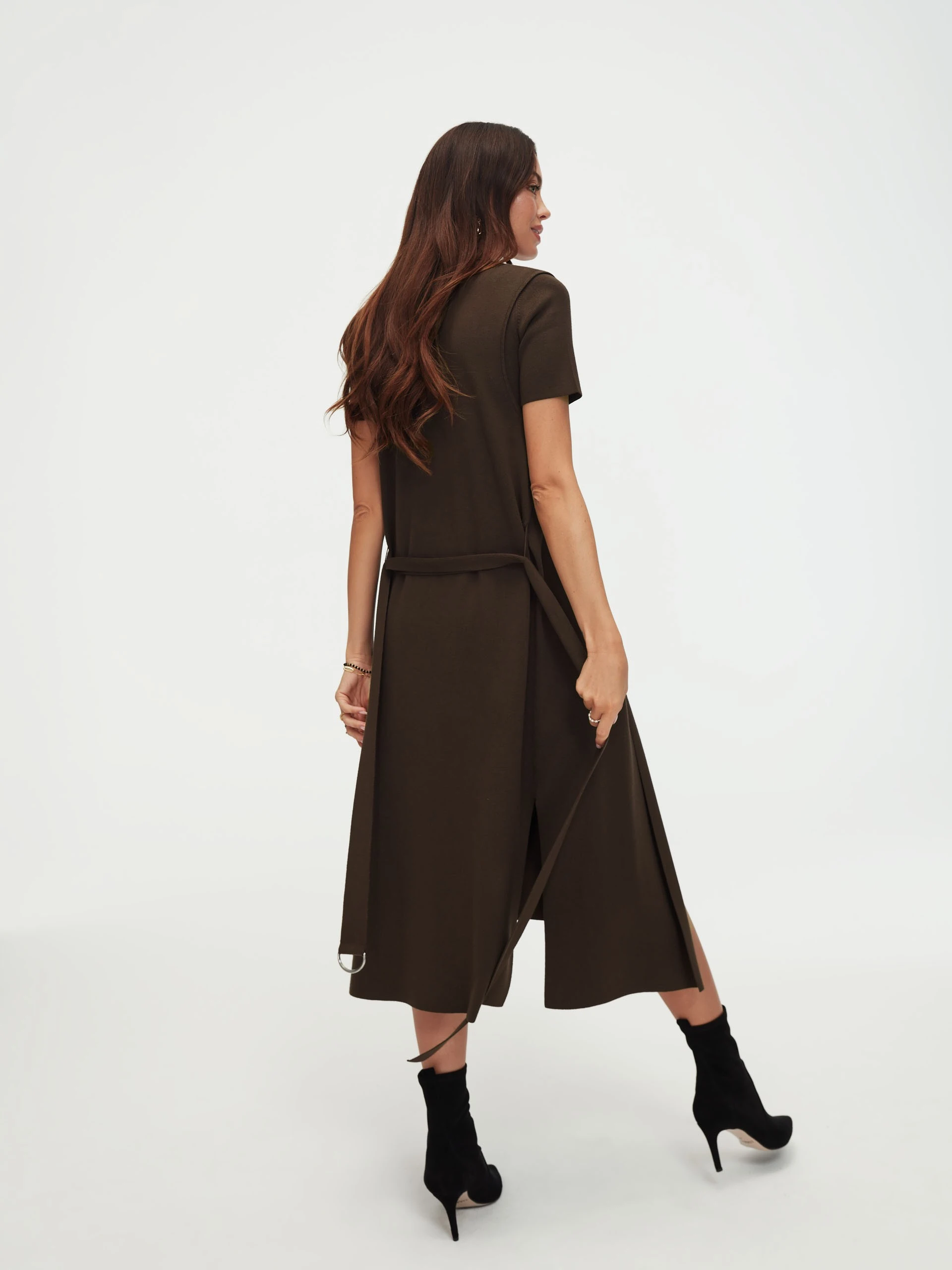 Long brown sleeveless sweater