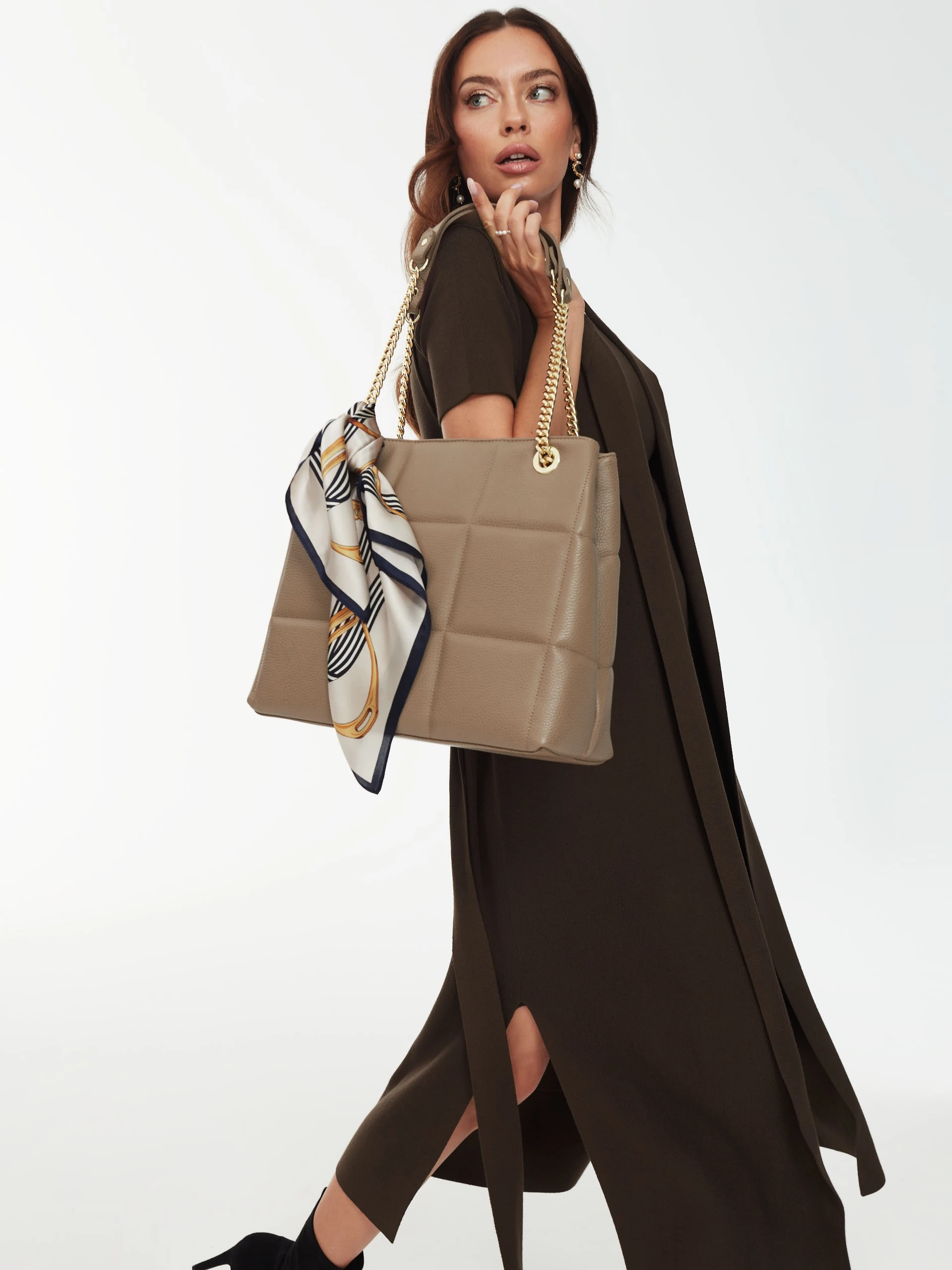 Long brown sleeveless sweater