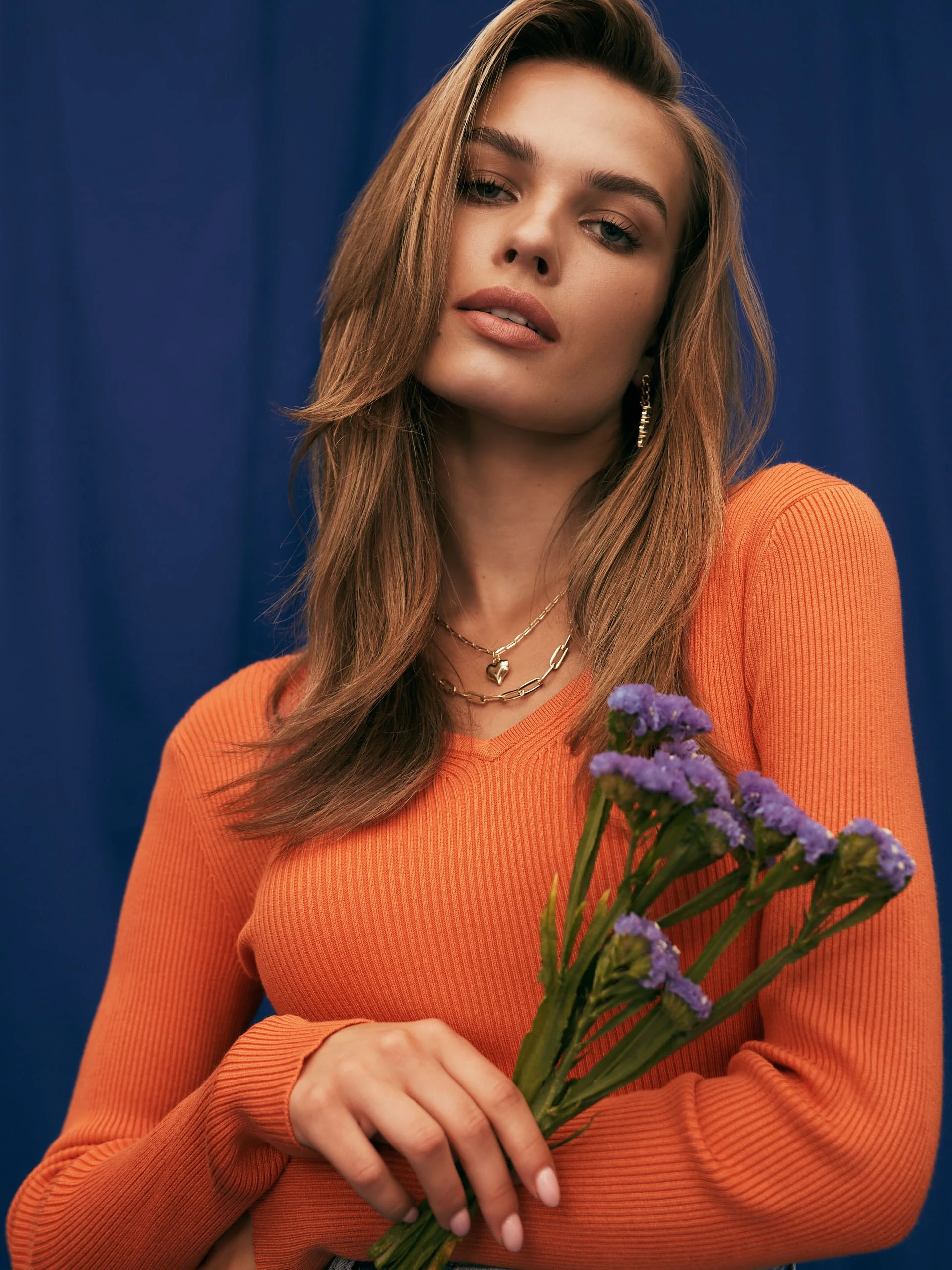 Orange knitted sweater