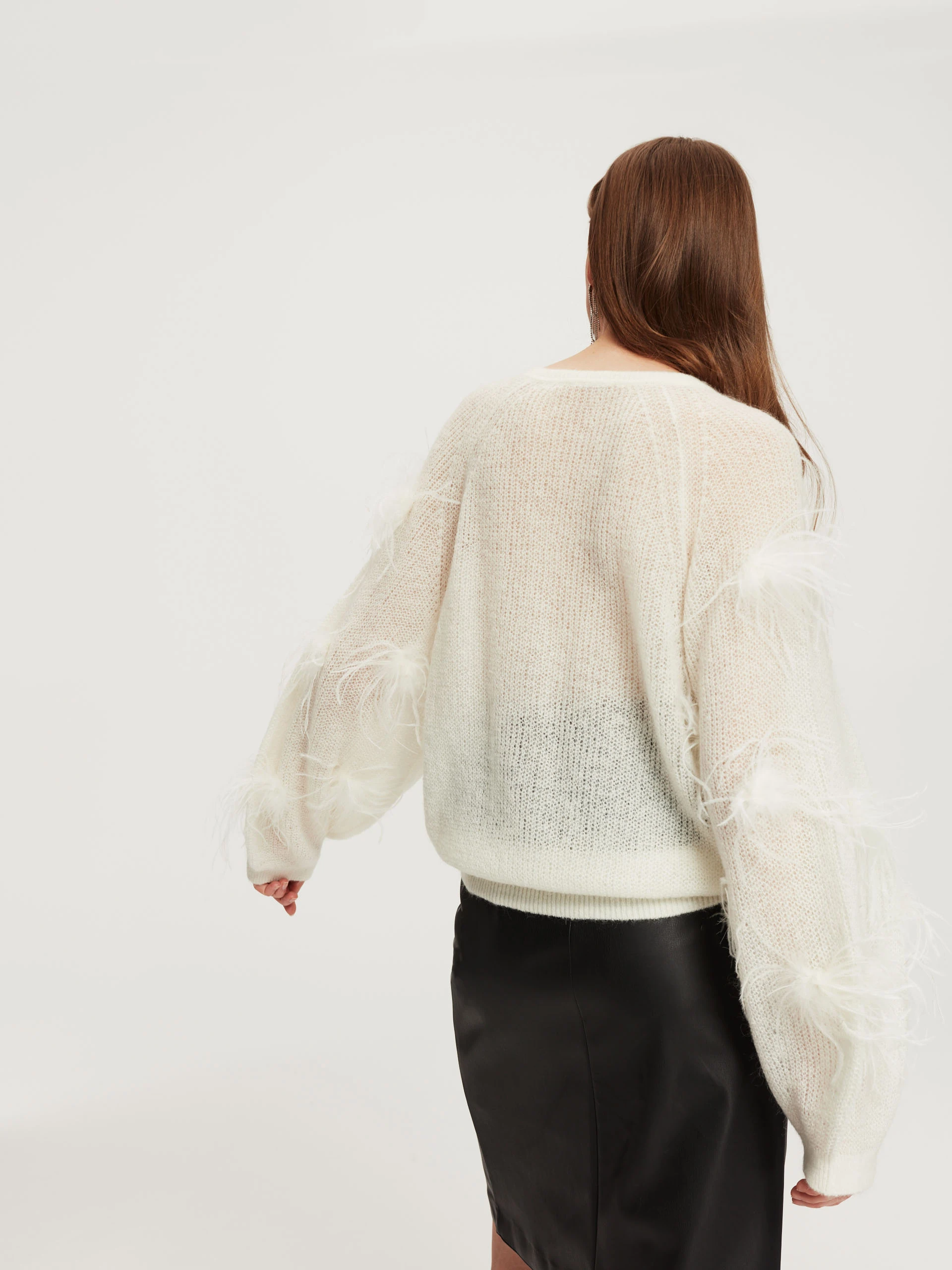 Beige sweater with ostrich feathers