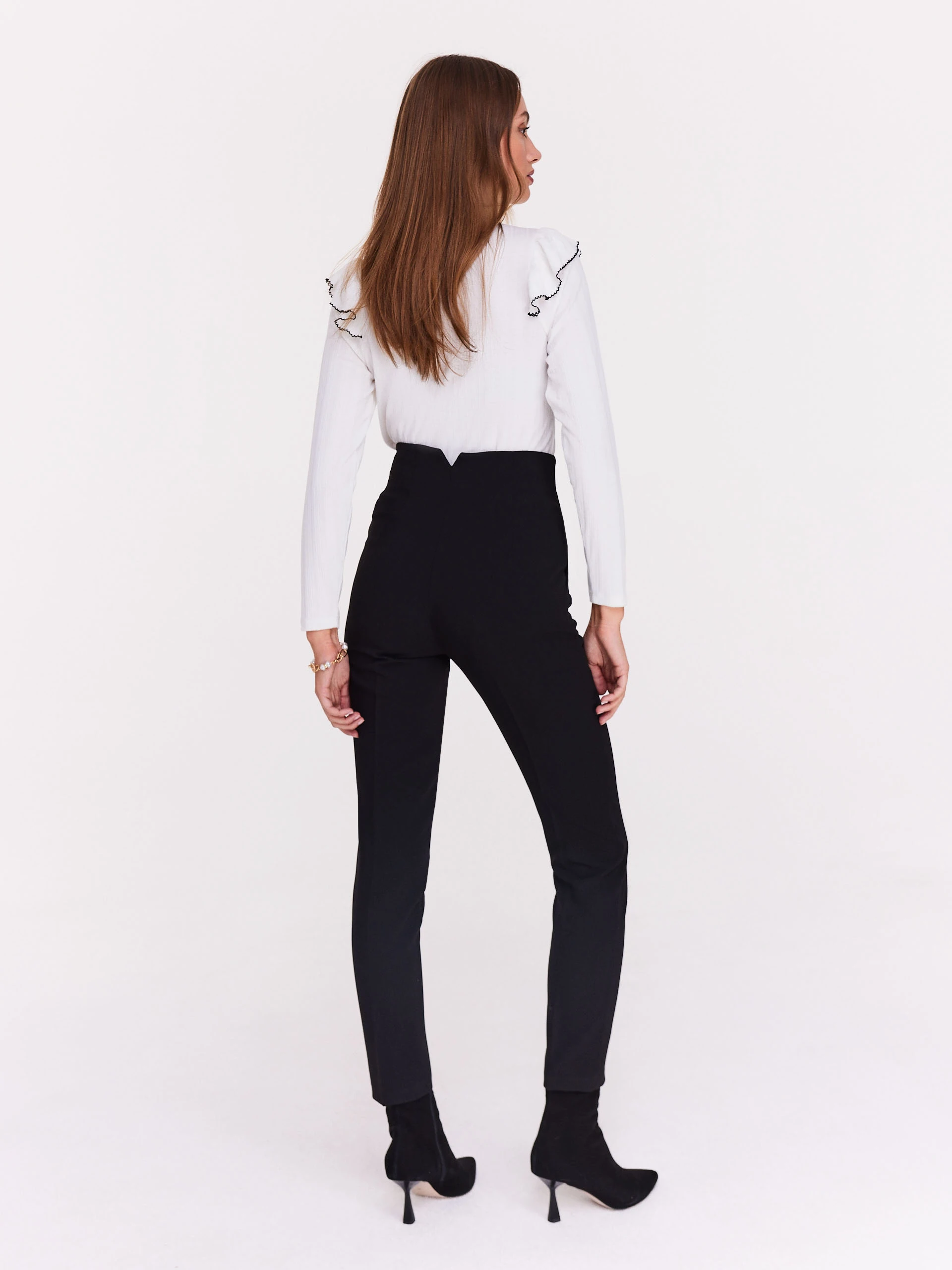 White blouse with stand-up collar and ruffles