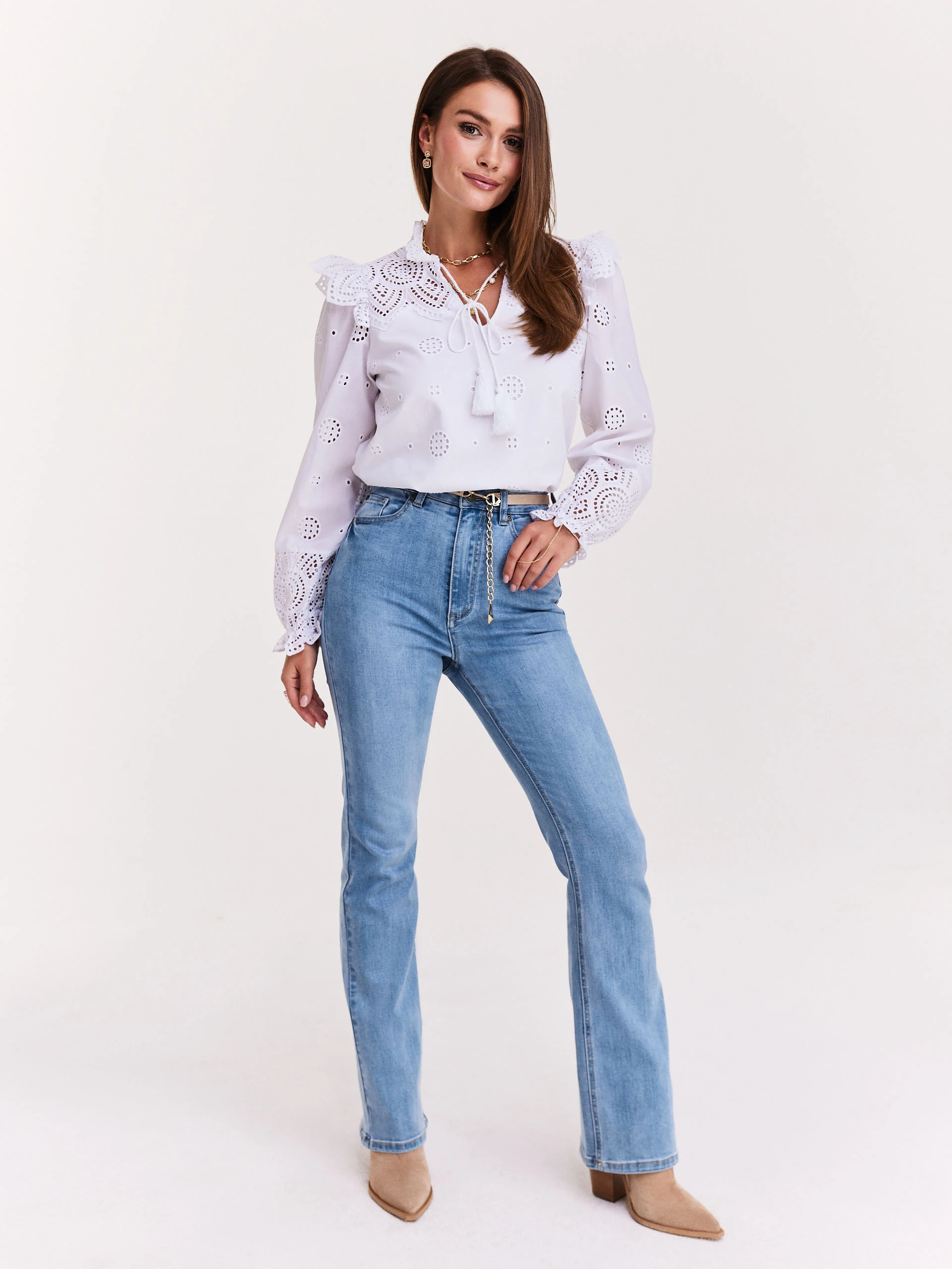 White blouse with openwork inserts