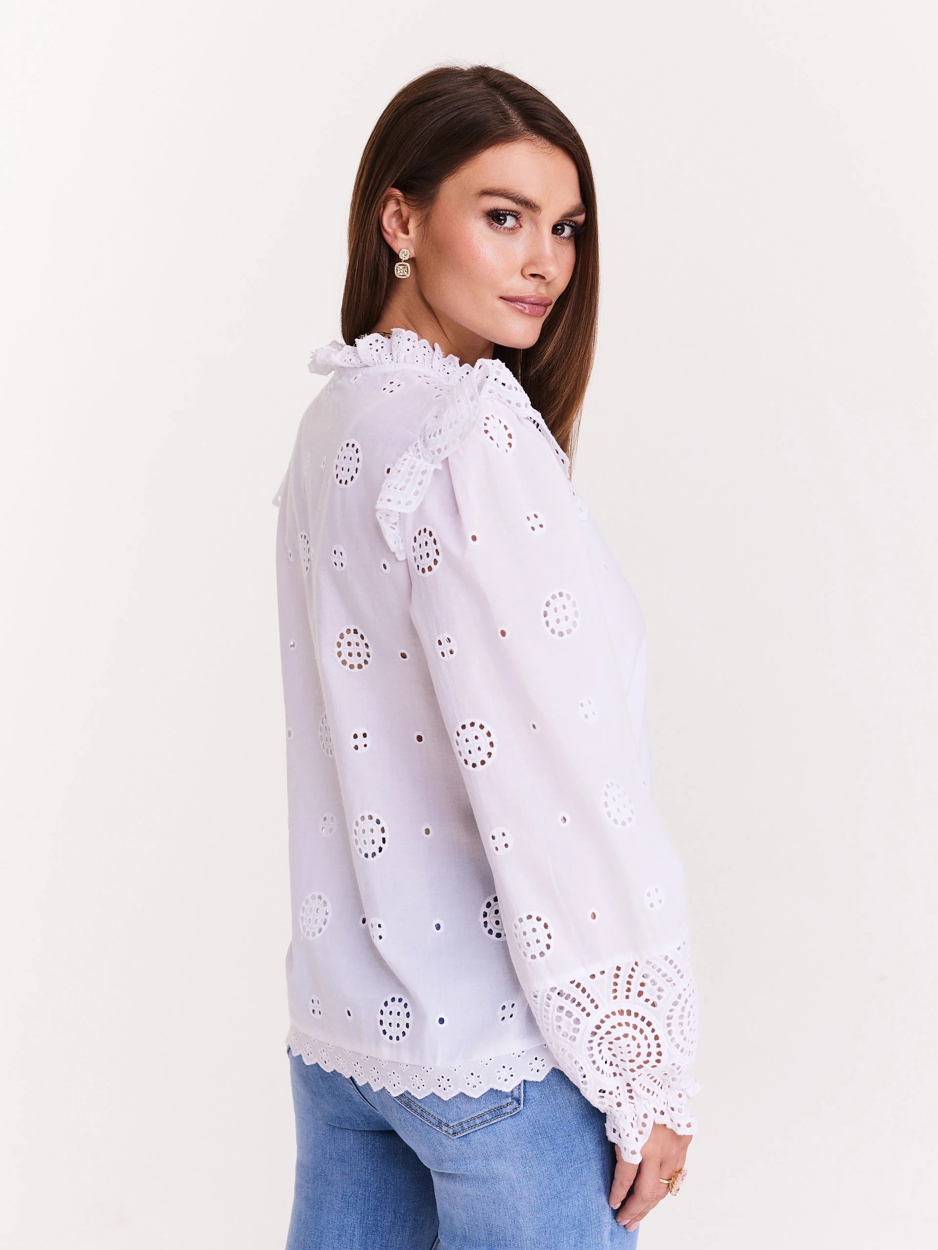 White blouse with openwork inserts