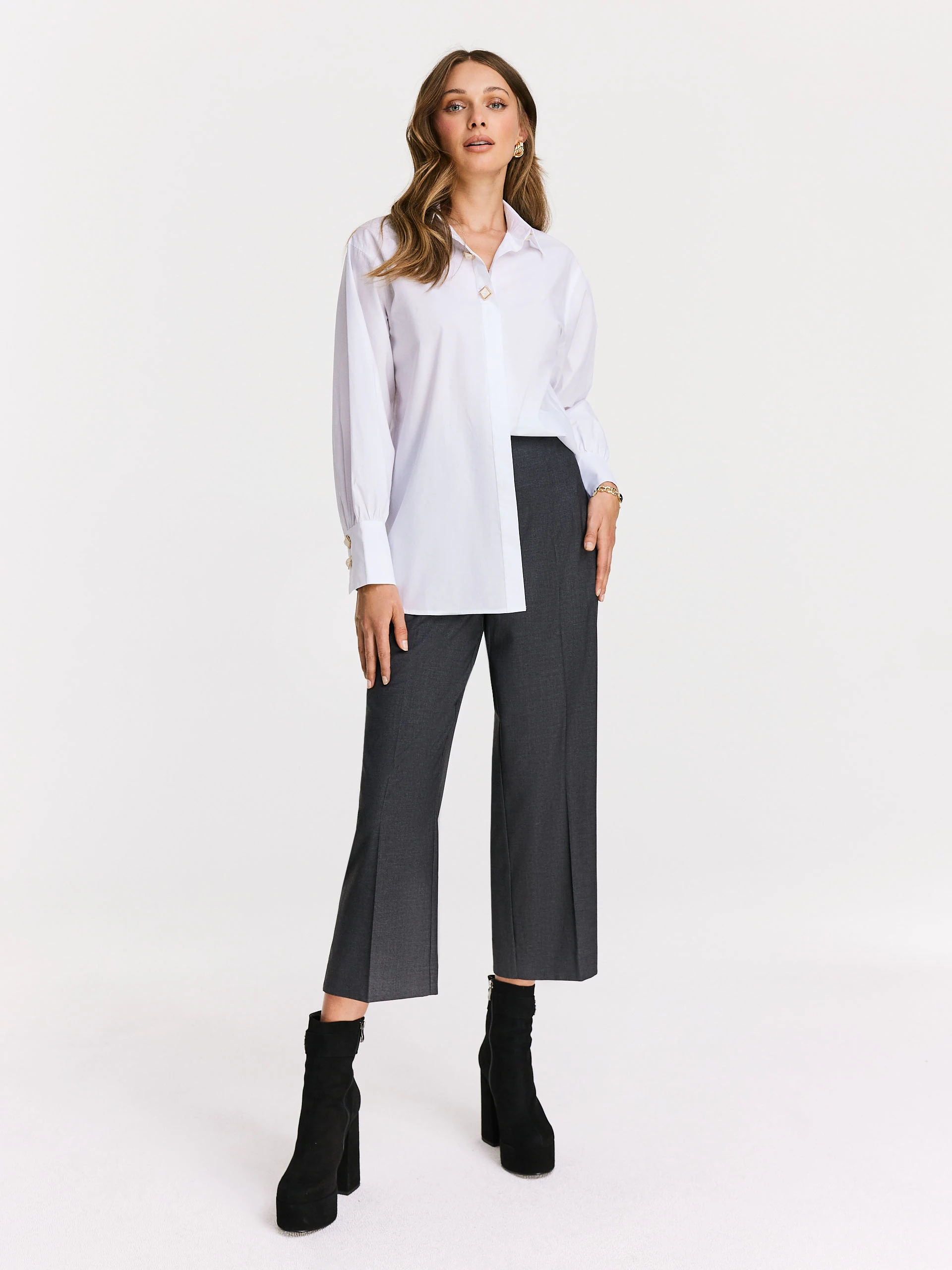 White shirt with decorative buttons