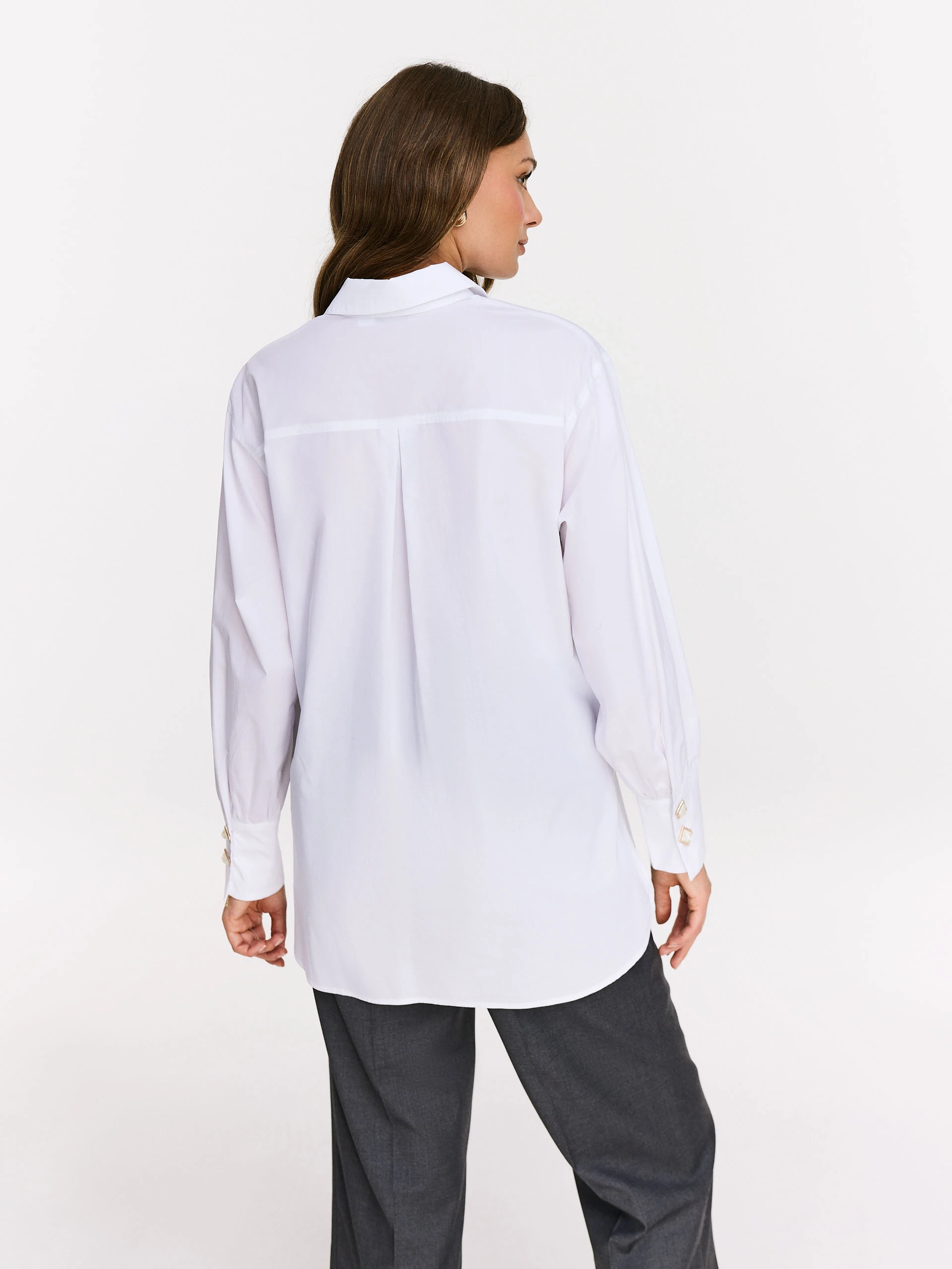 White shirt with decorative buttons