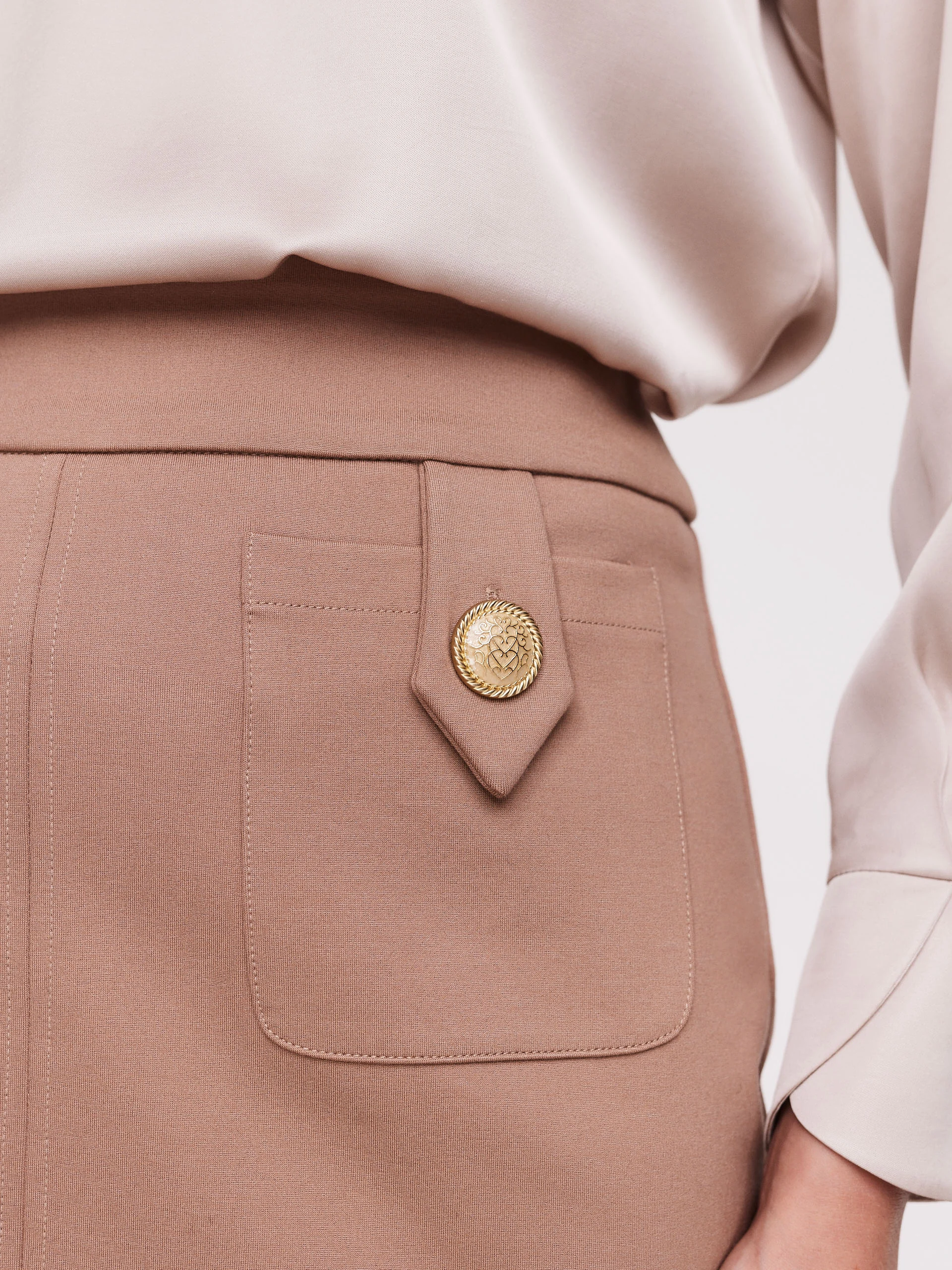 High-waisted pencil skirt in a warm shade of beige