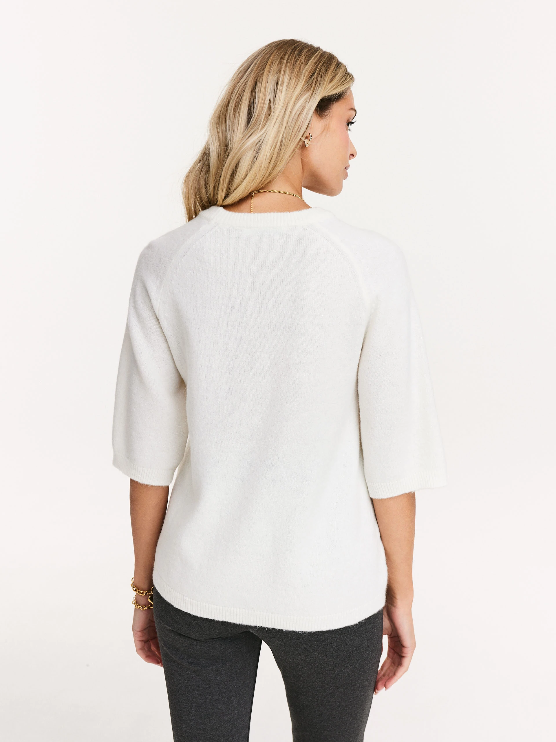 White sweater with 3/4 sleeves