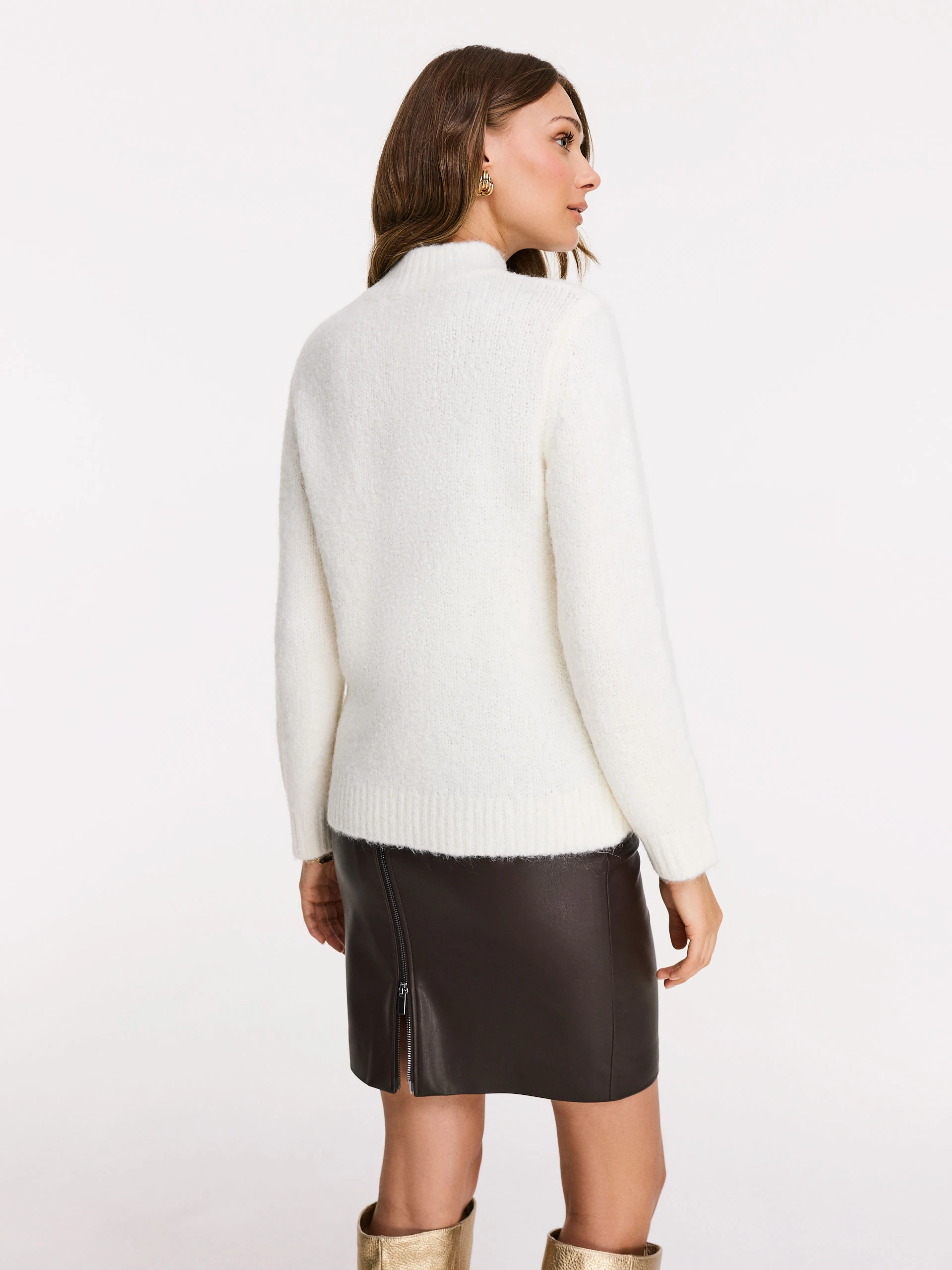White knit sweater with a loose weave