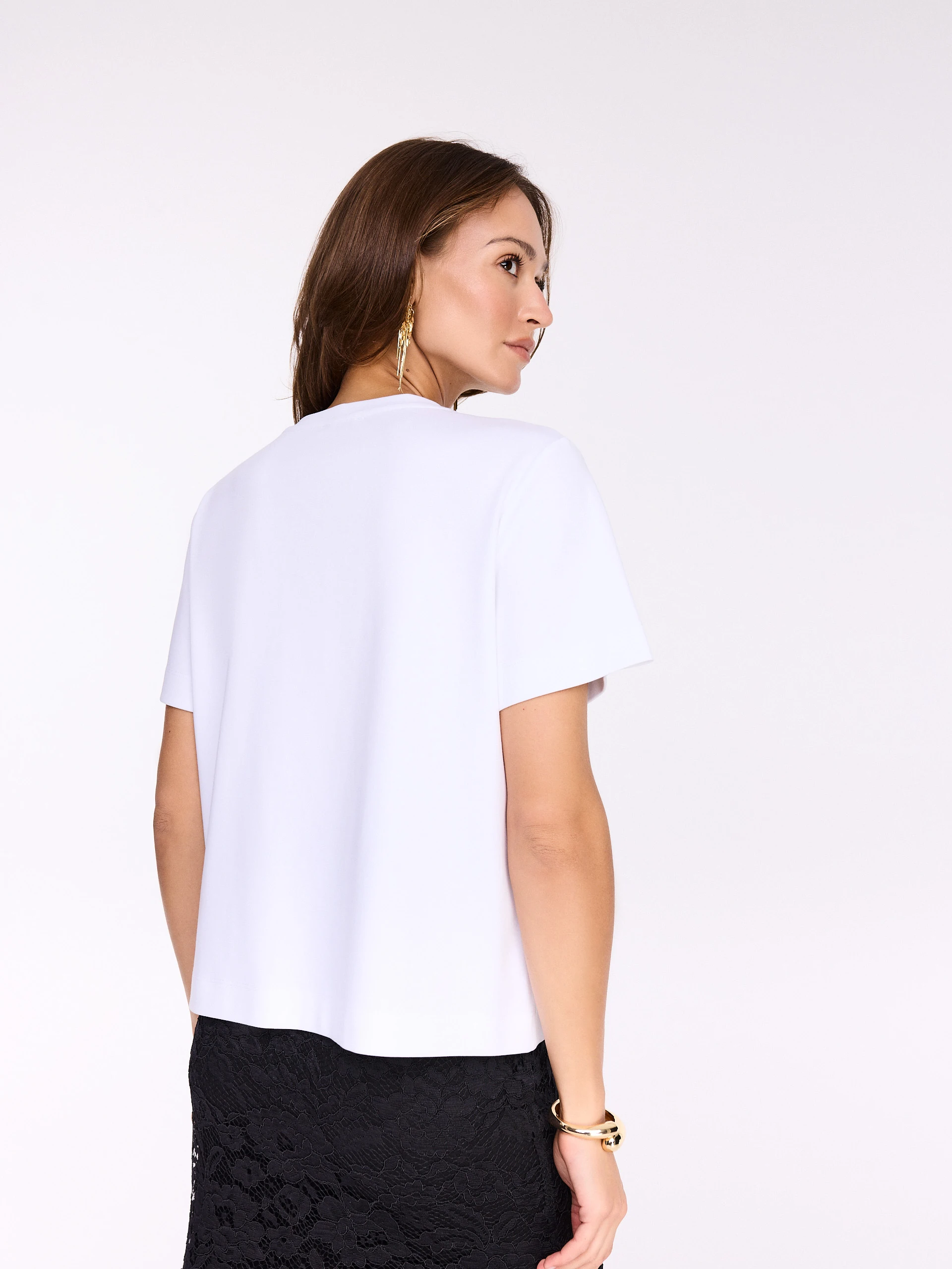 Cotton blouse with a feminine sequin flower