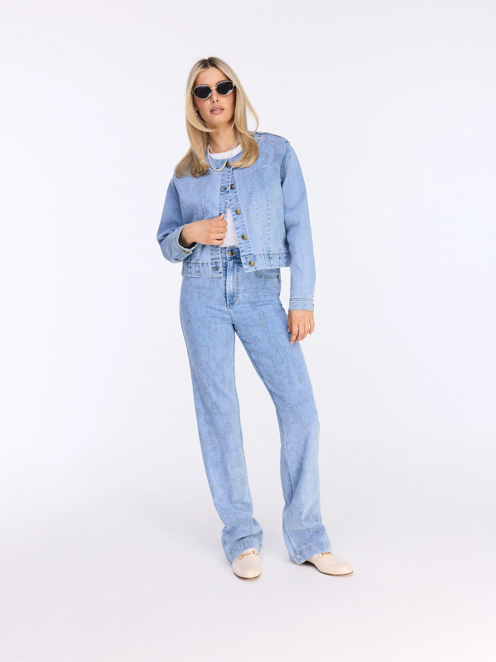 Short denim jacket with embroidered embellishment