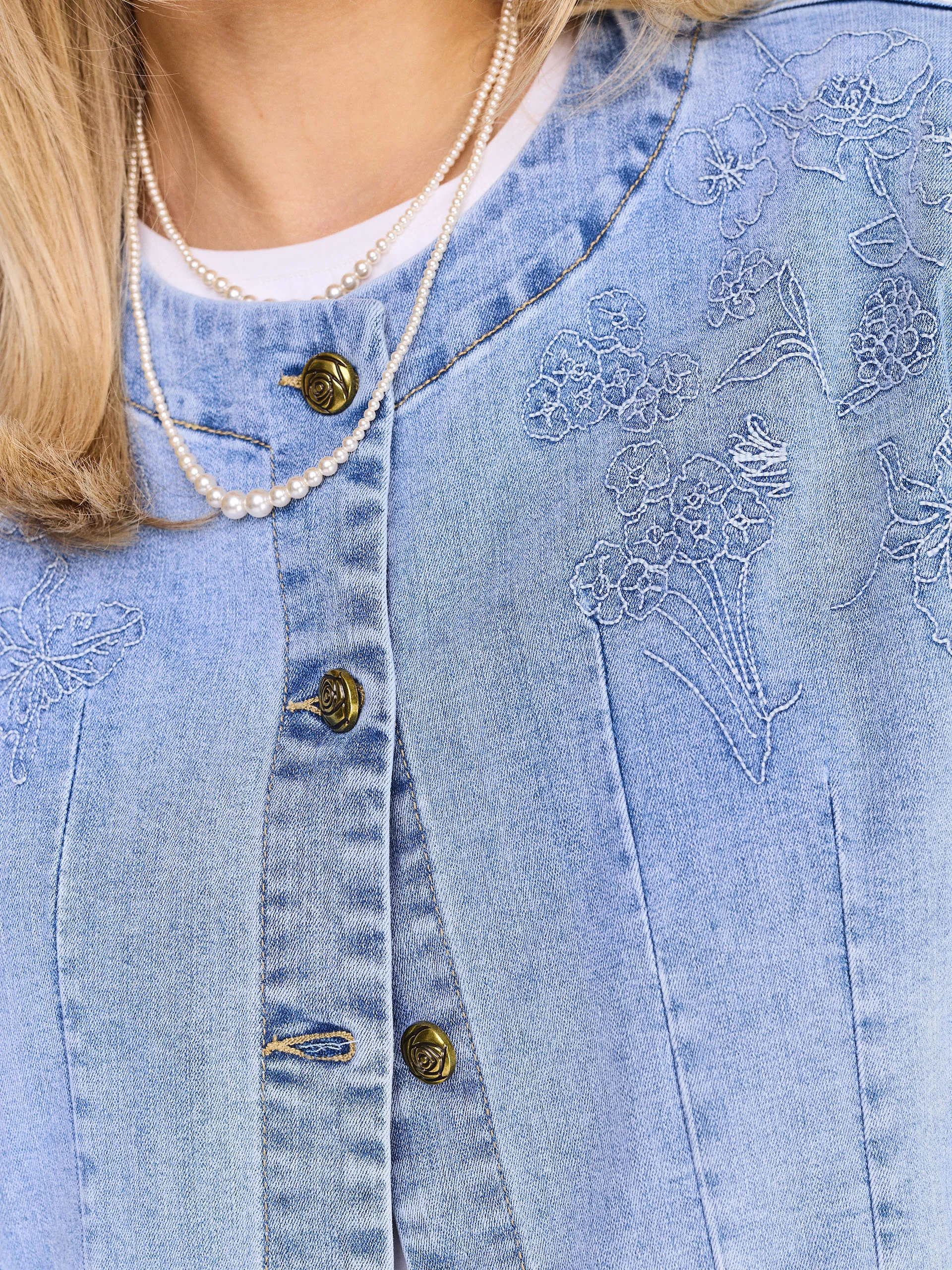 Short denim jacket with embroidered embellishment