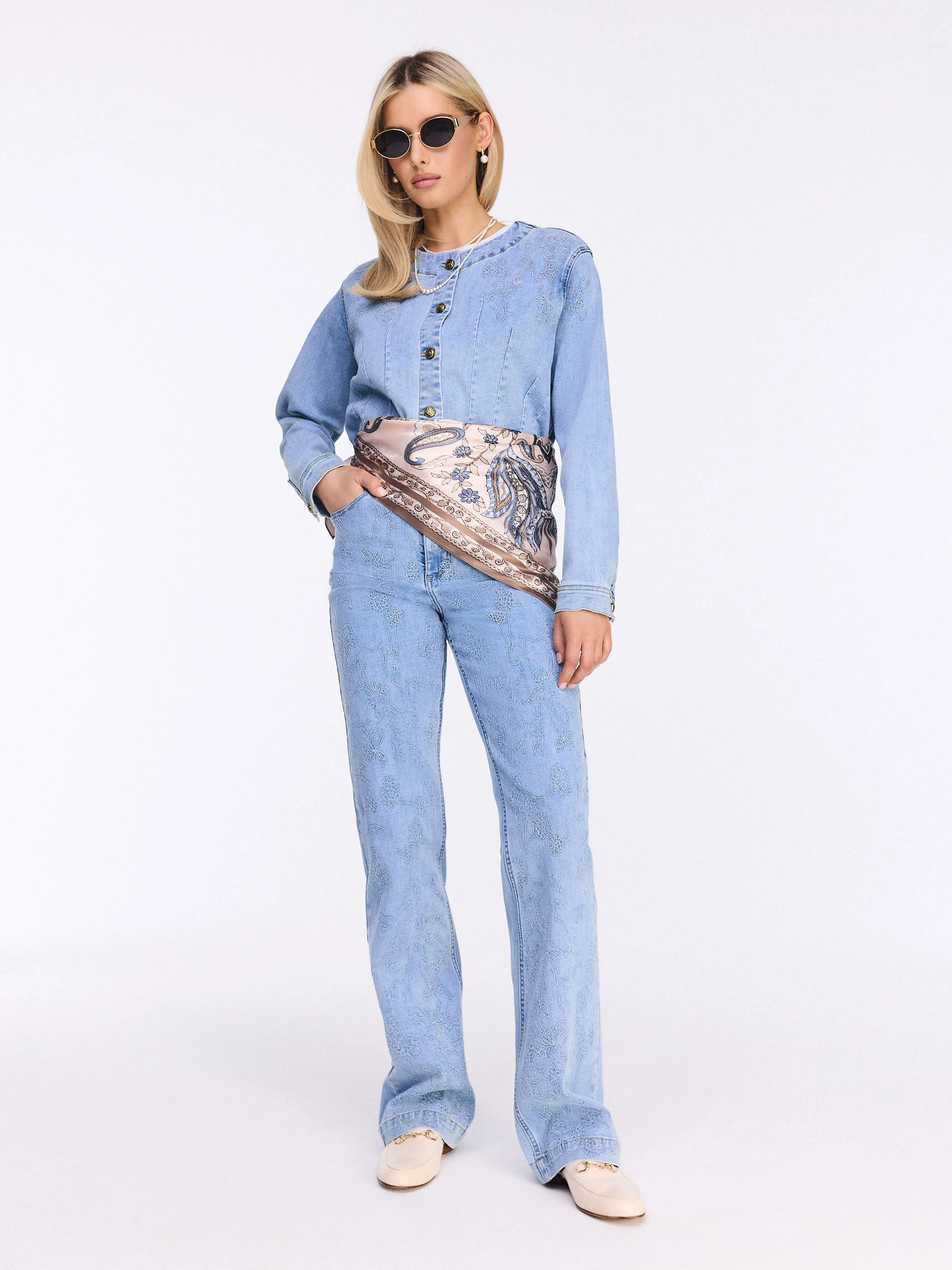 Short denim jacket with embroidered embellishment