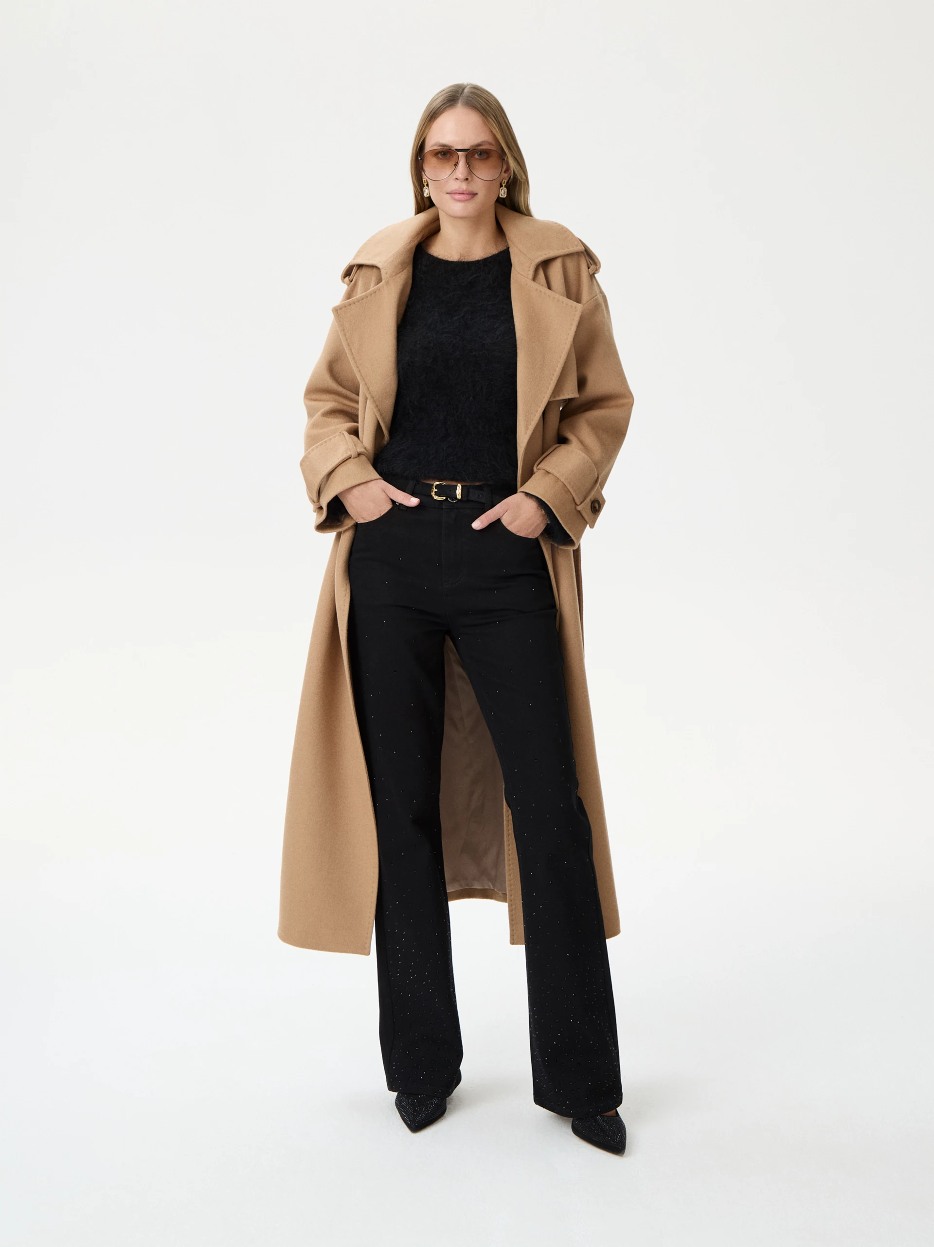 Black bell-bottom pants with shiny detail