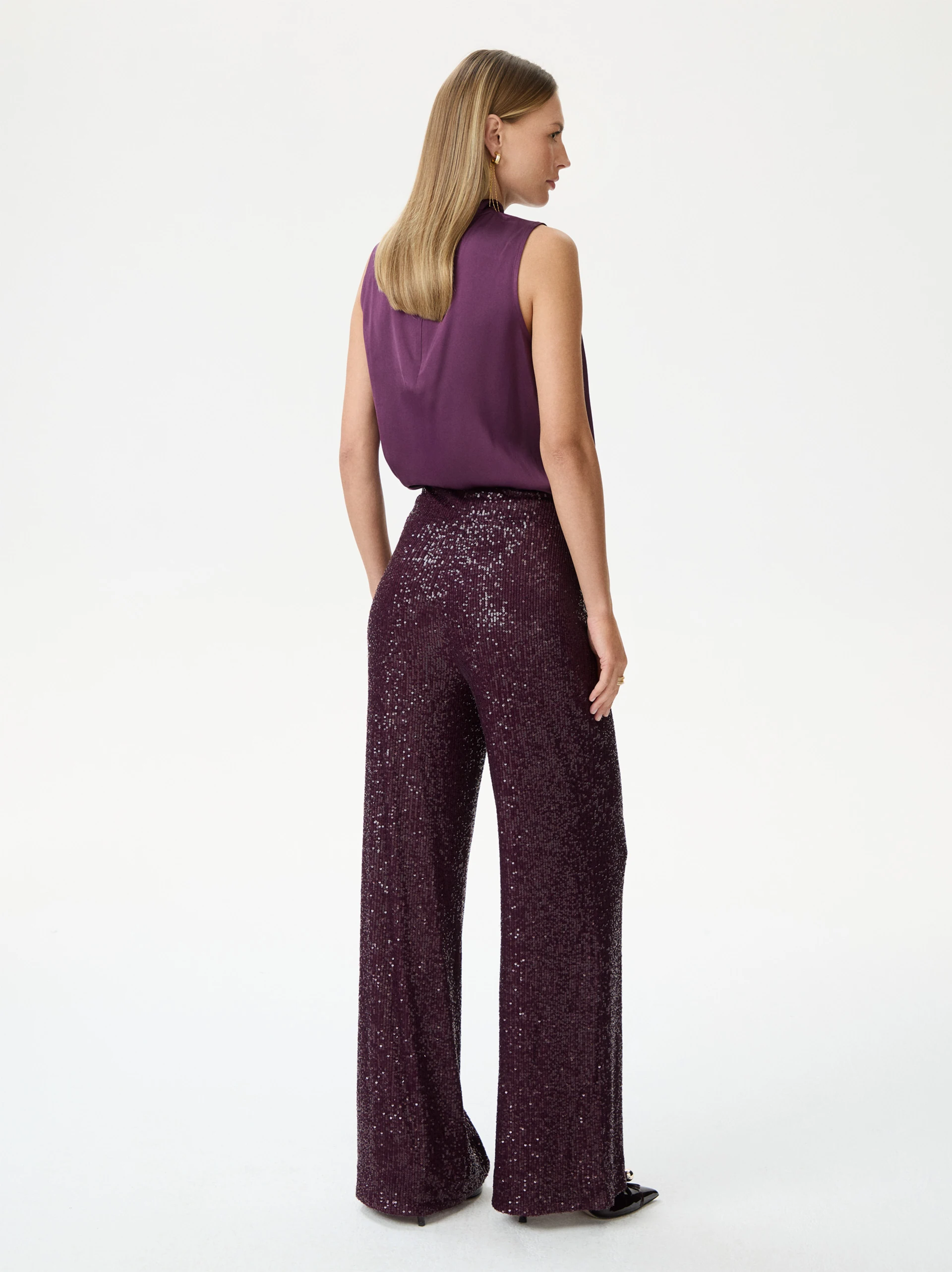 Long sequined pants in burgundy
