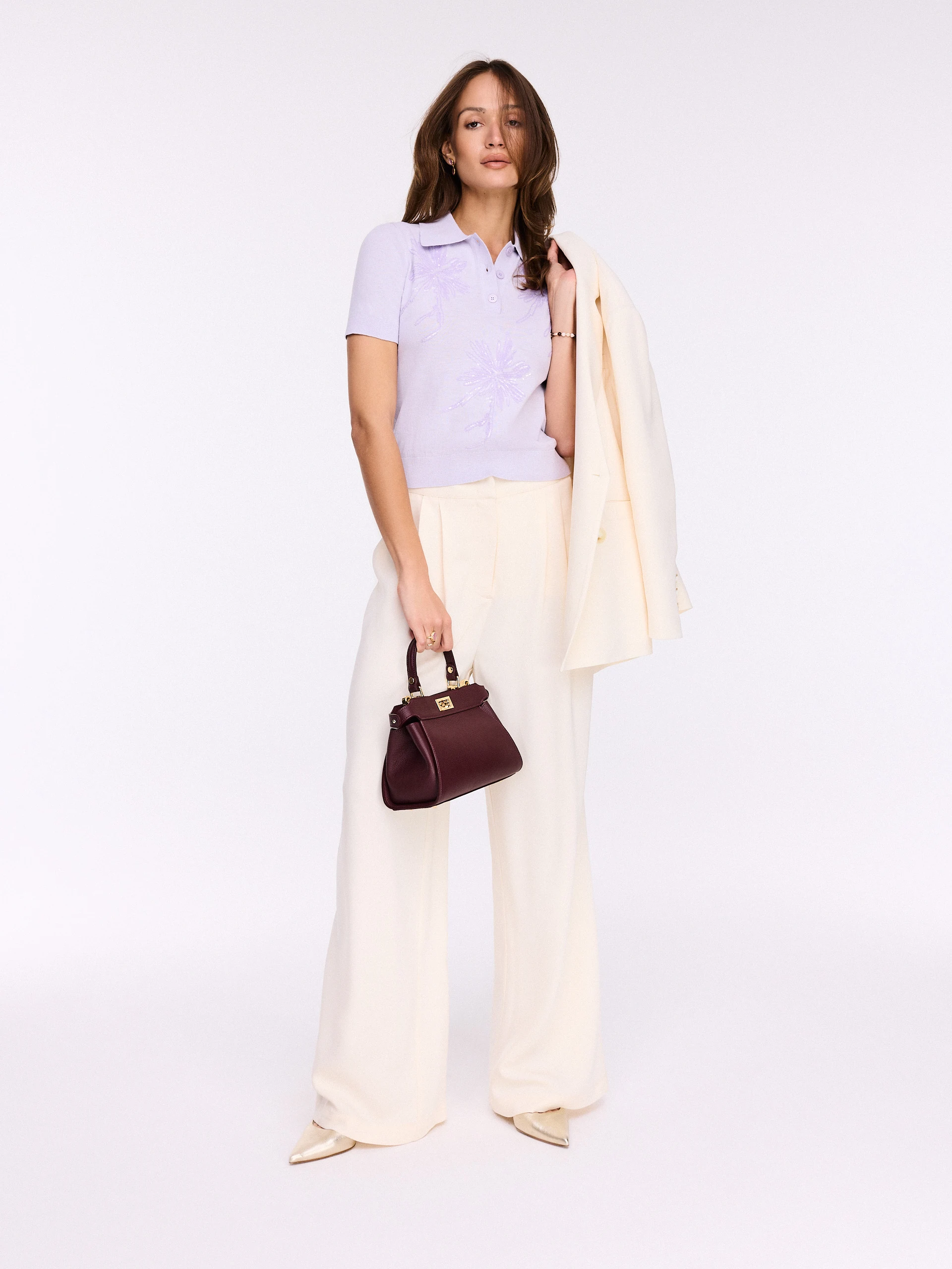 Lilac polo sweater with embroidered appliqués
