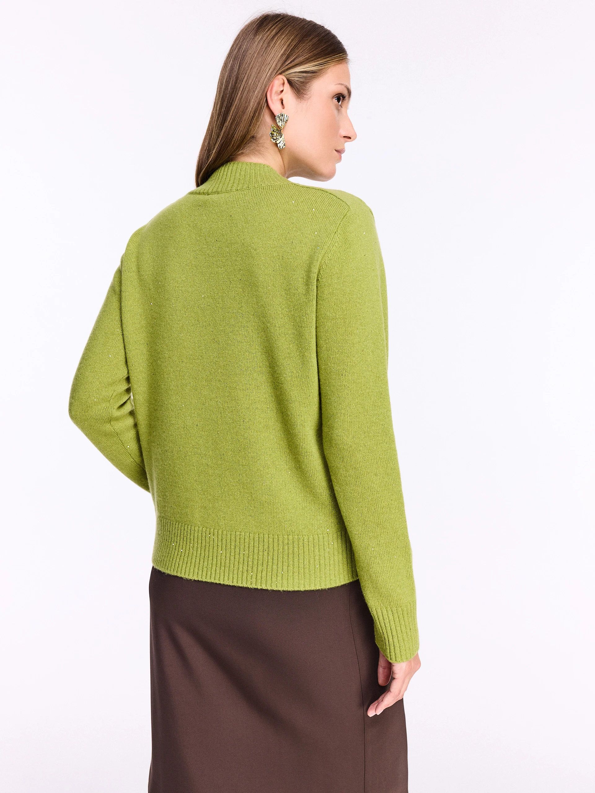 Green wool sweater with shiny flecks
