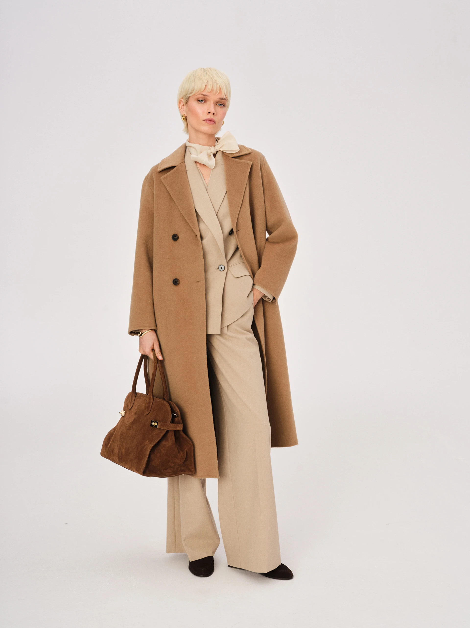 Elegant beige double-breasted jacket