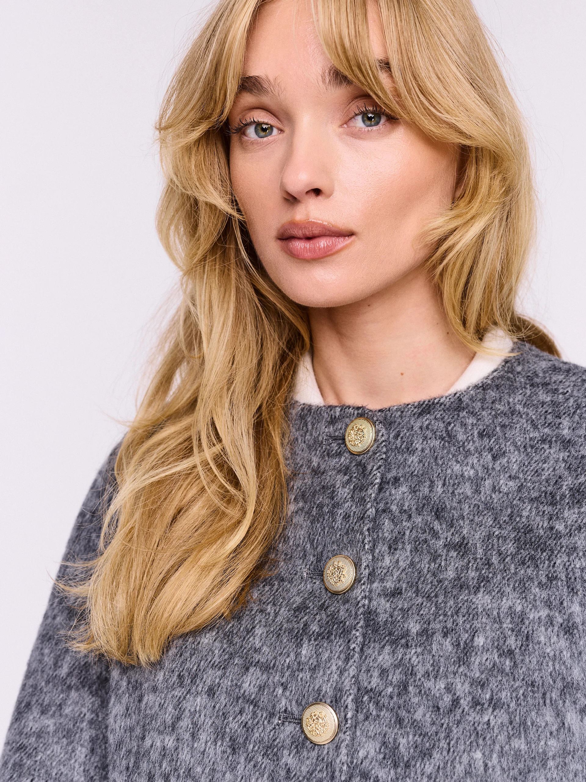 Short boxy jacket made of wool with angora and silk