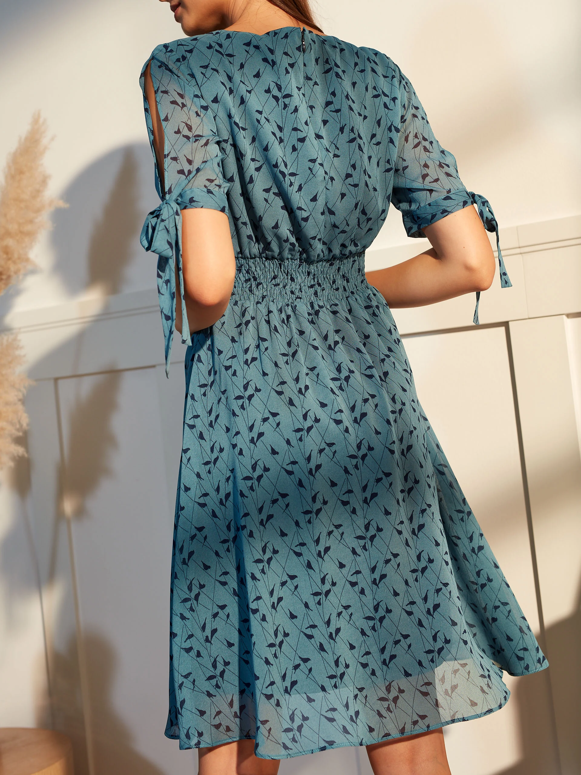 DRESS WITH CUT-OUTS ON SHOULDERS
