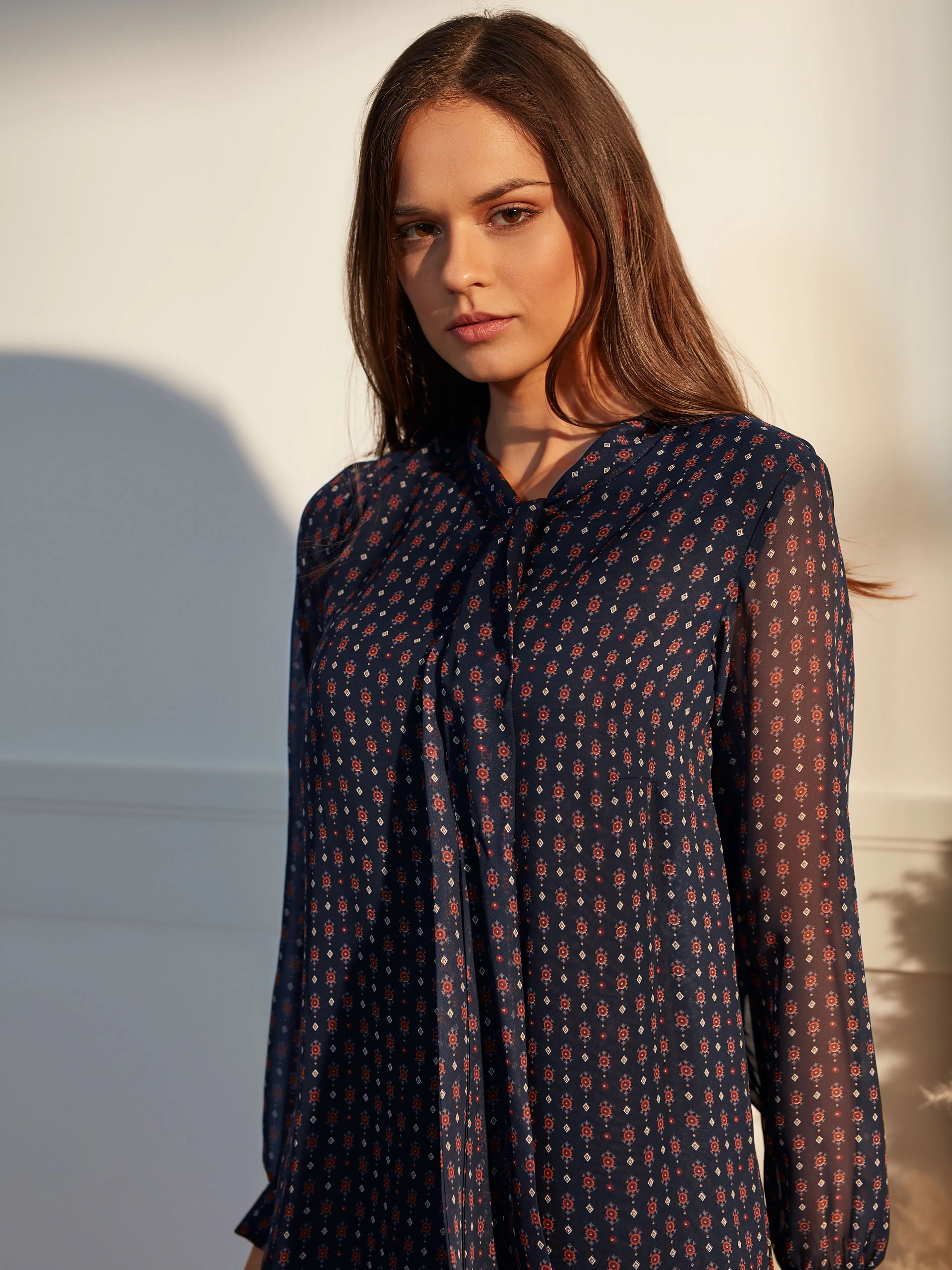 DRESS WITH A RUFFLE AT THE BOTTOM