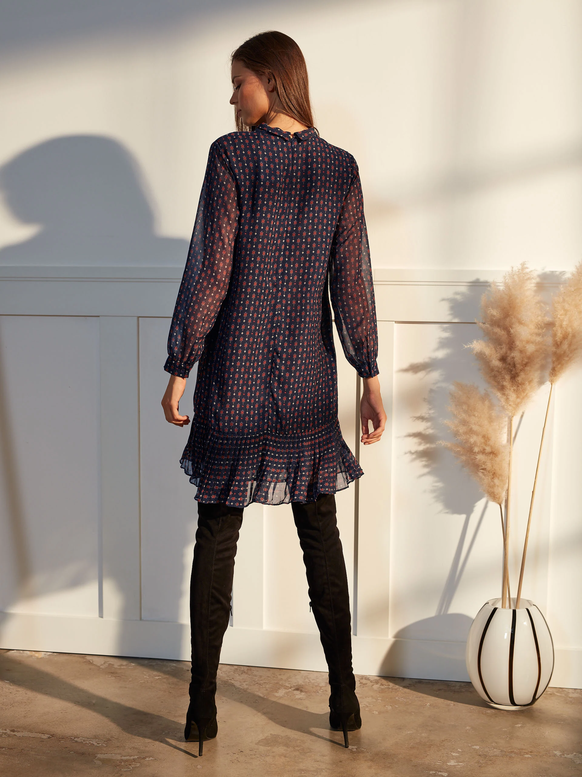 DRESS WITH A RUFFLE AT THE BOTTOM