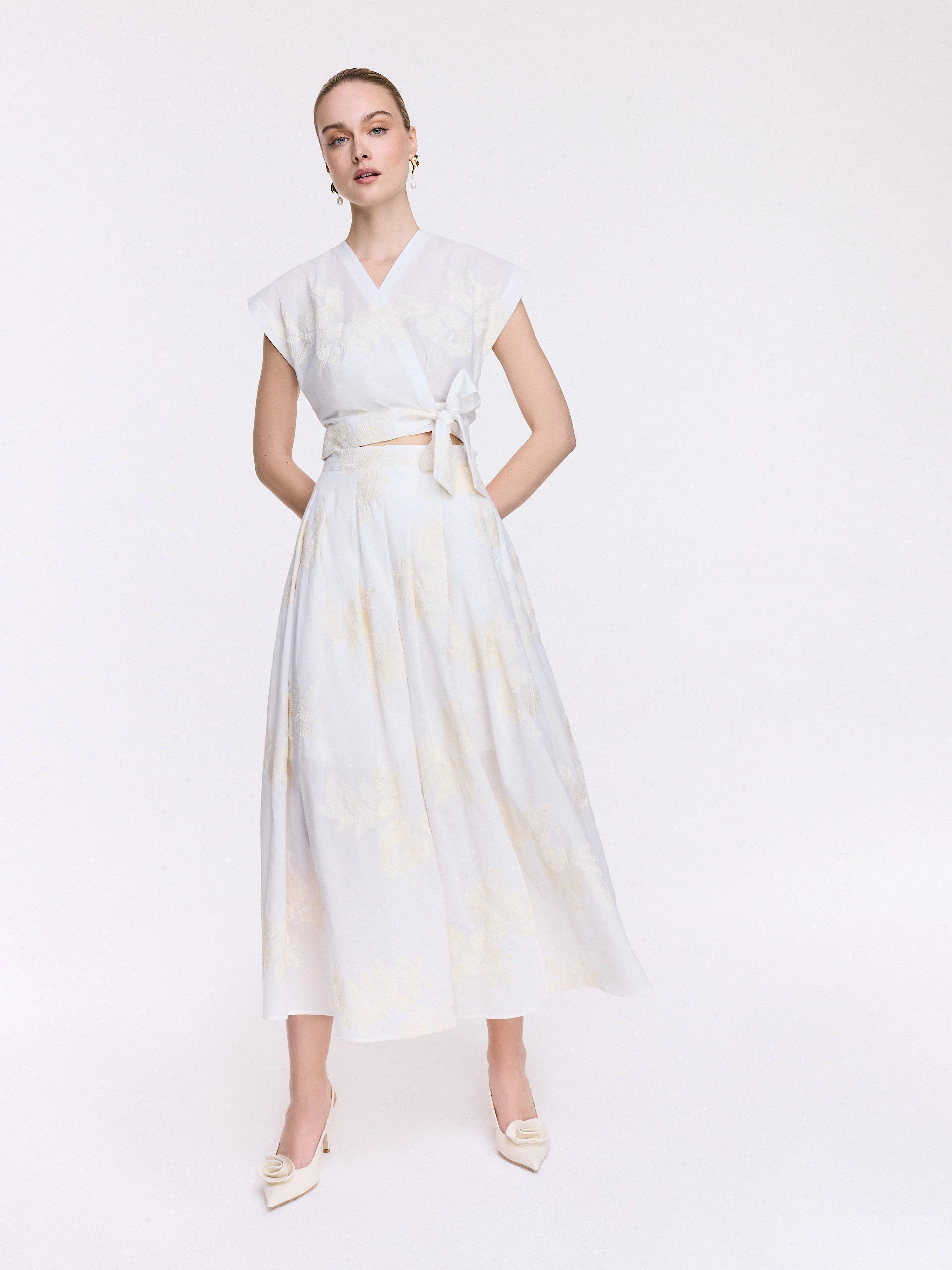 High-waisted cream-colored embroidered skirt