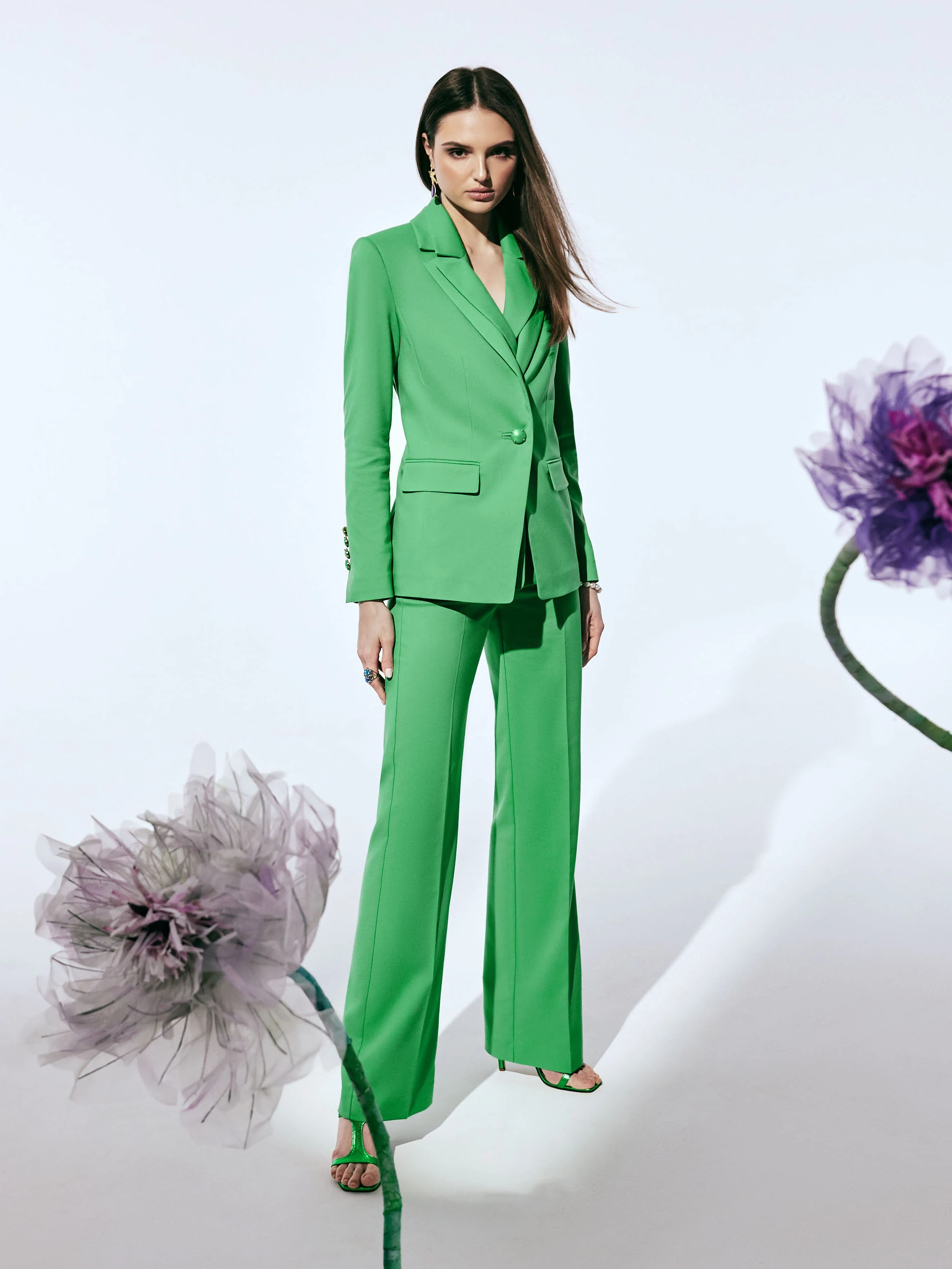 Classic green jacket with a single button closure