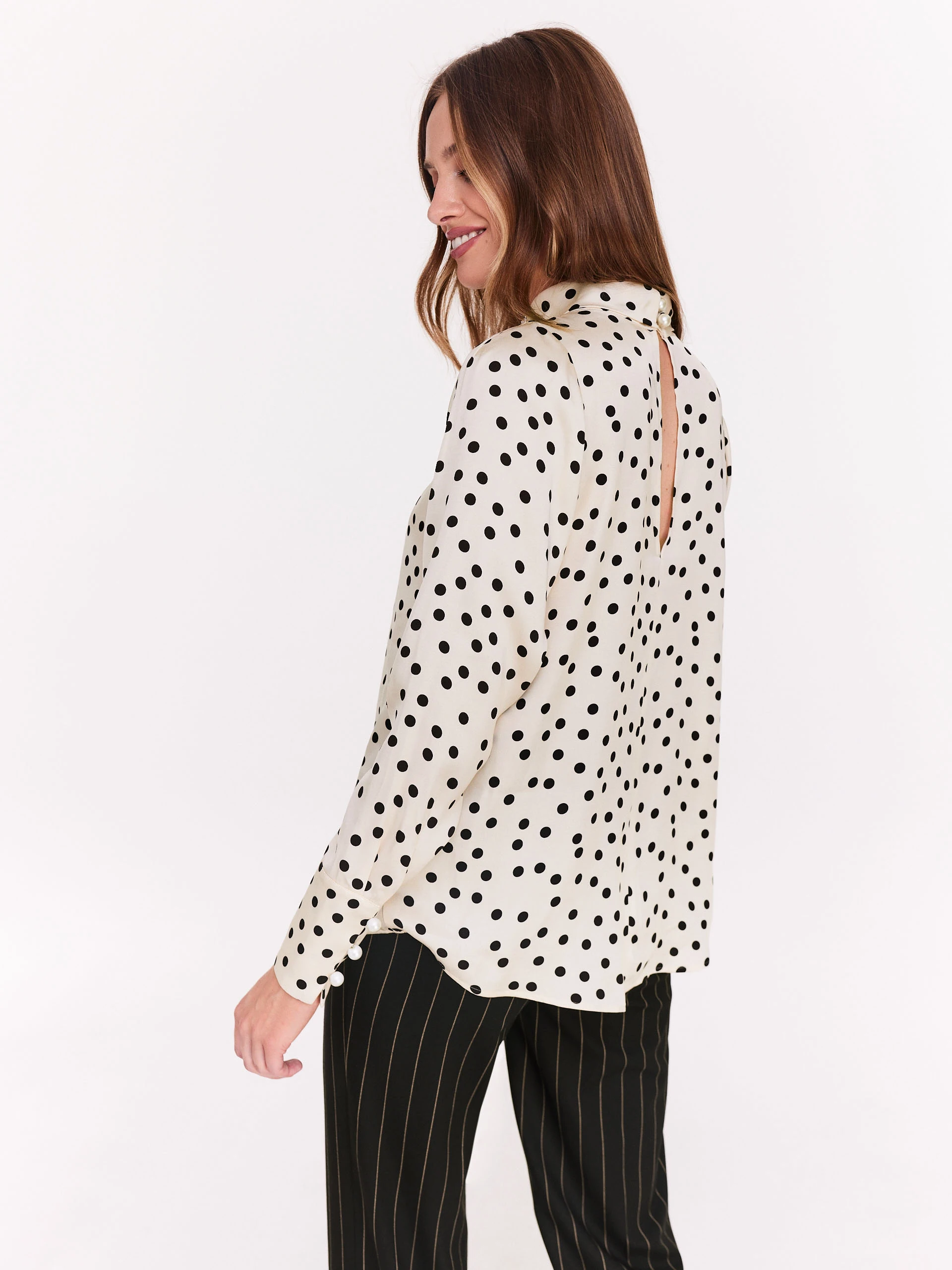 Cream pea blouse with pearl brooch