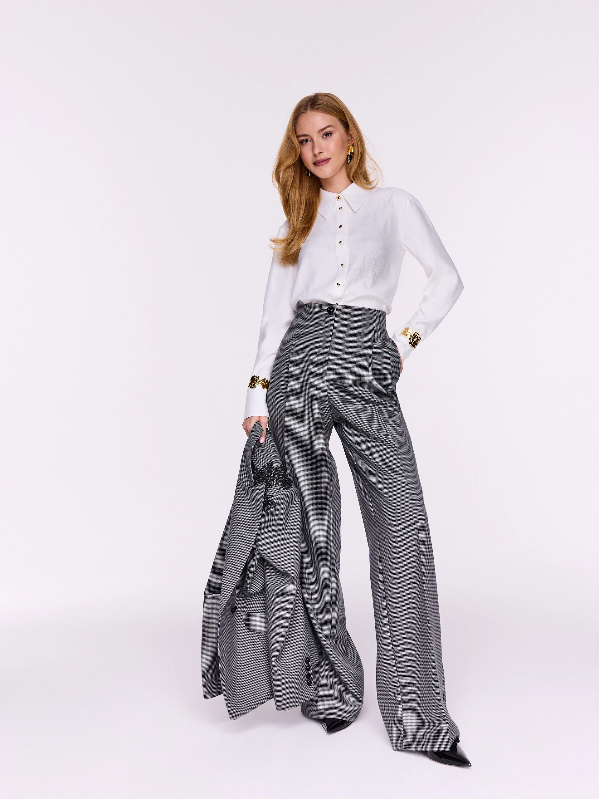 Elegant high-waisted wool houndstooth trousers