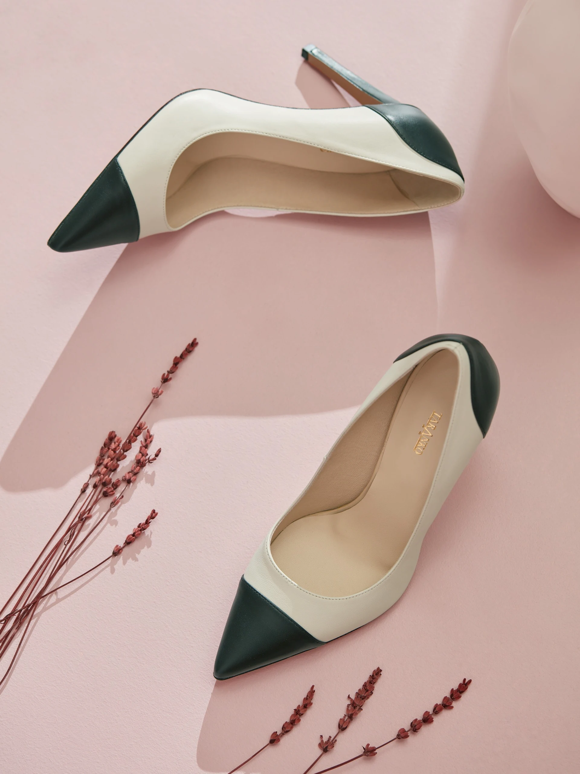 BLACK AND BEIGE STILETTO PUMPS