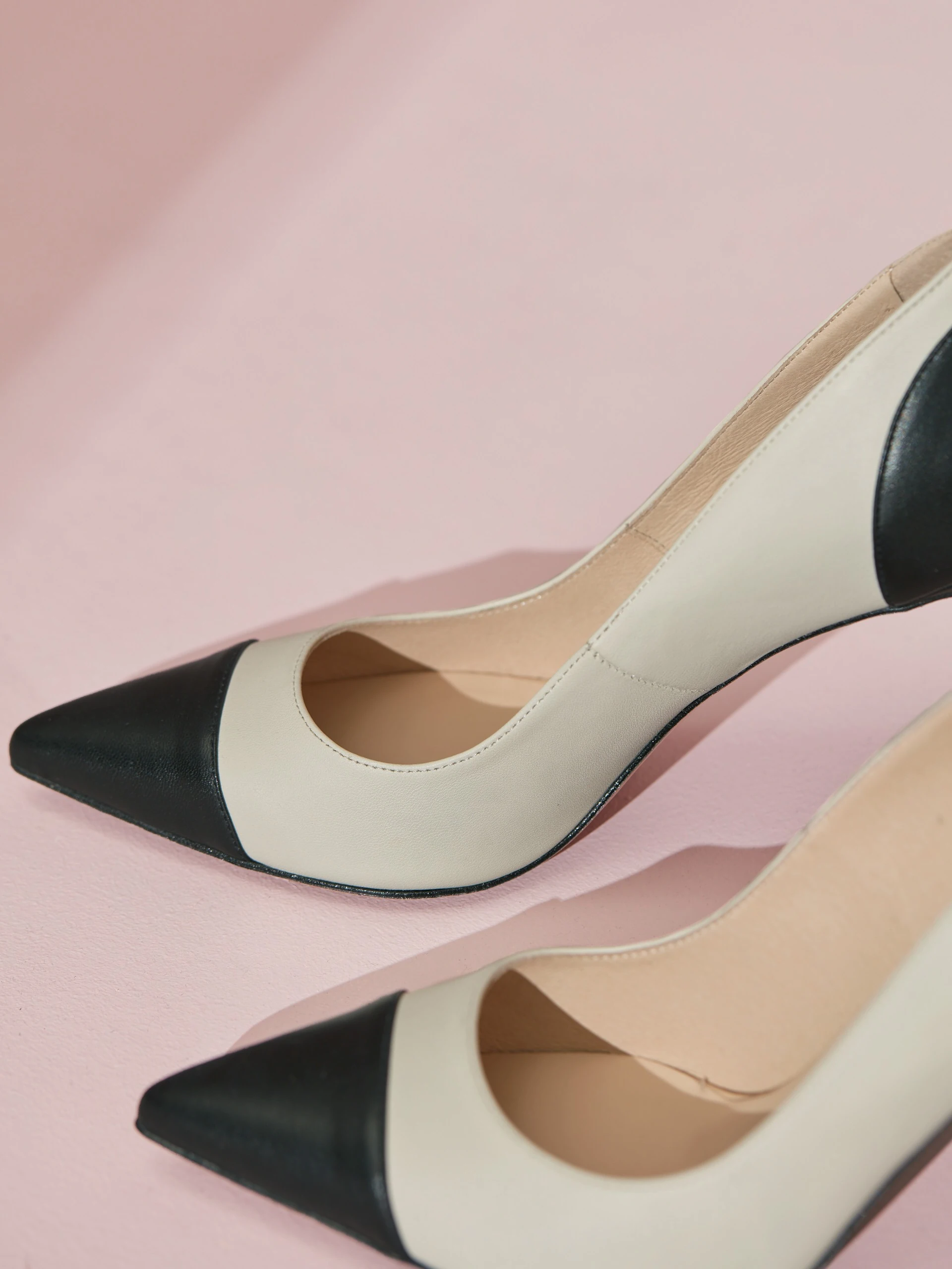 BLACK AND BEIGE STILETTO PUMPS