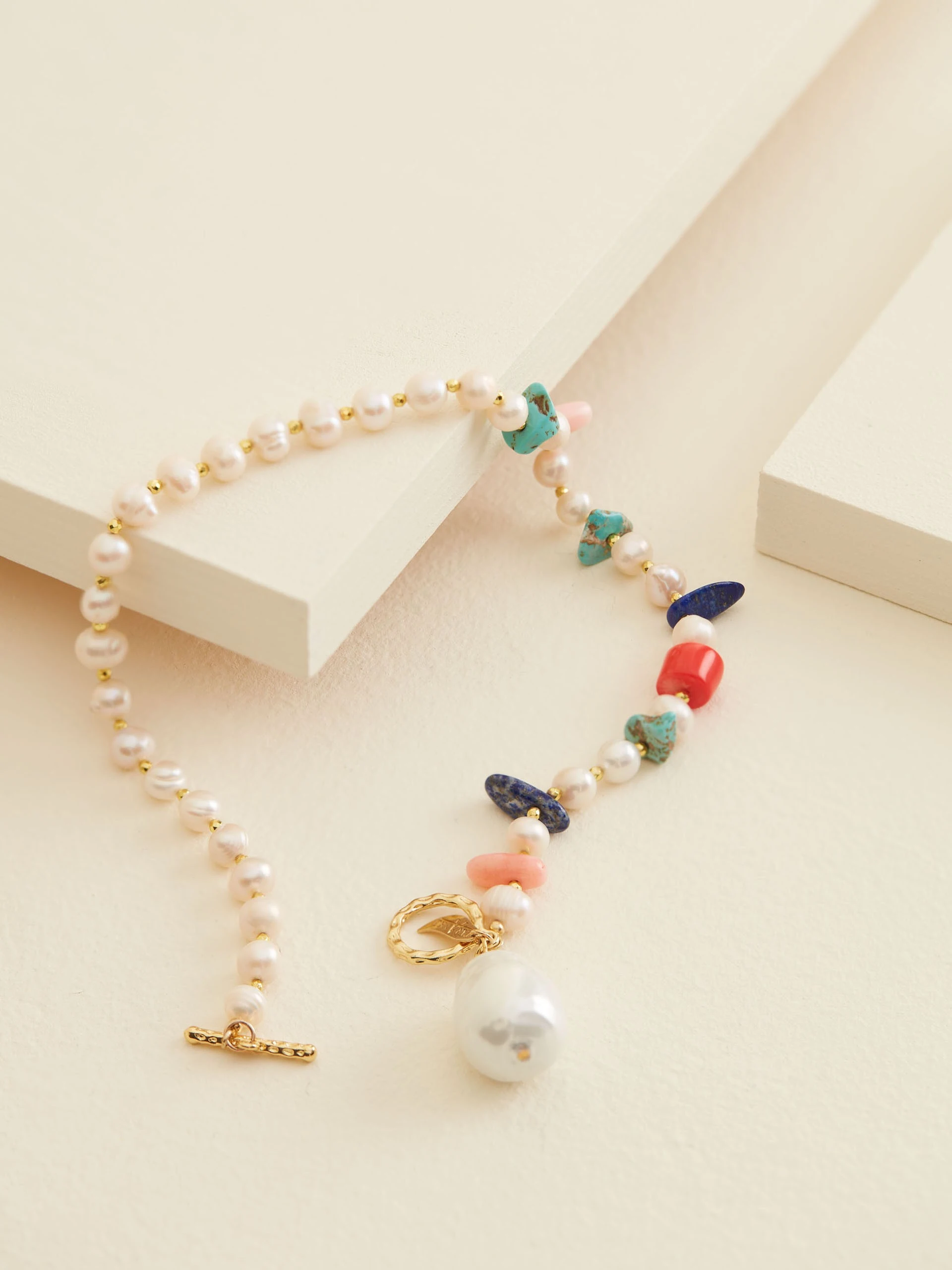PEARL NECKLACE WITH CHARMS