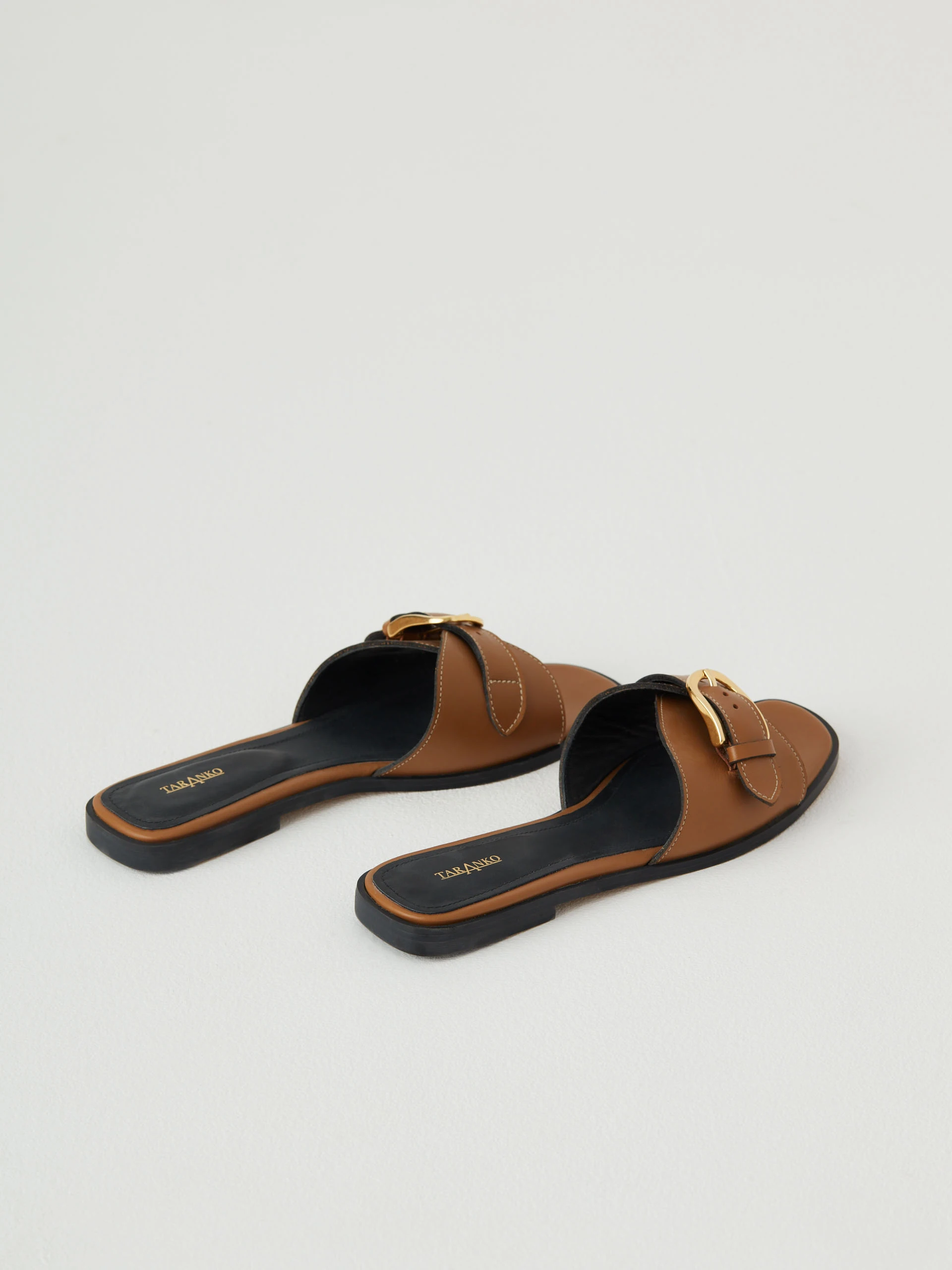 Brown flip-flops on a flat sole