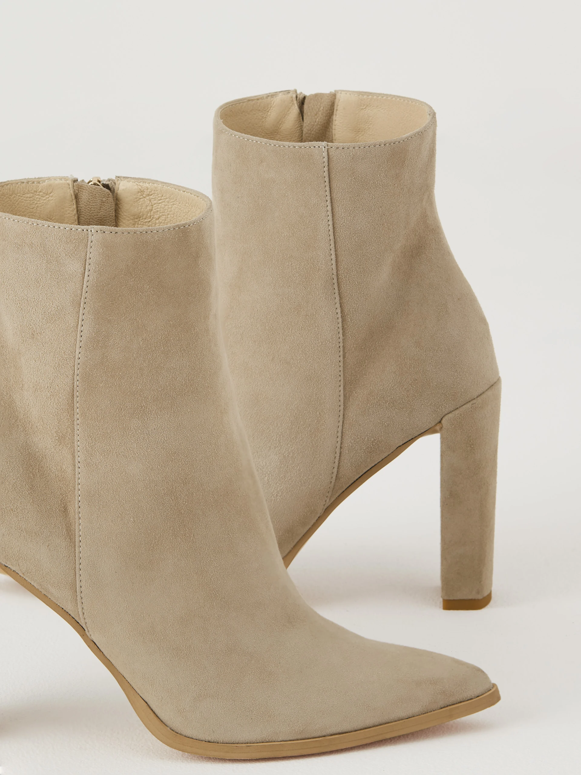 Beige heeled boots